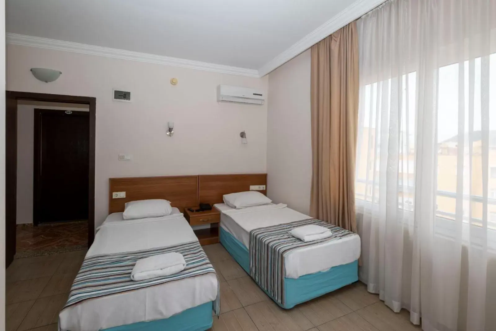 Photo of the whole room, Bed in Ozcan Hotel