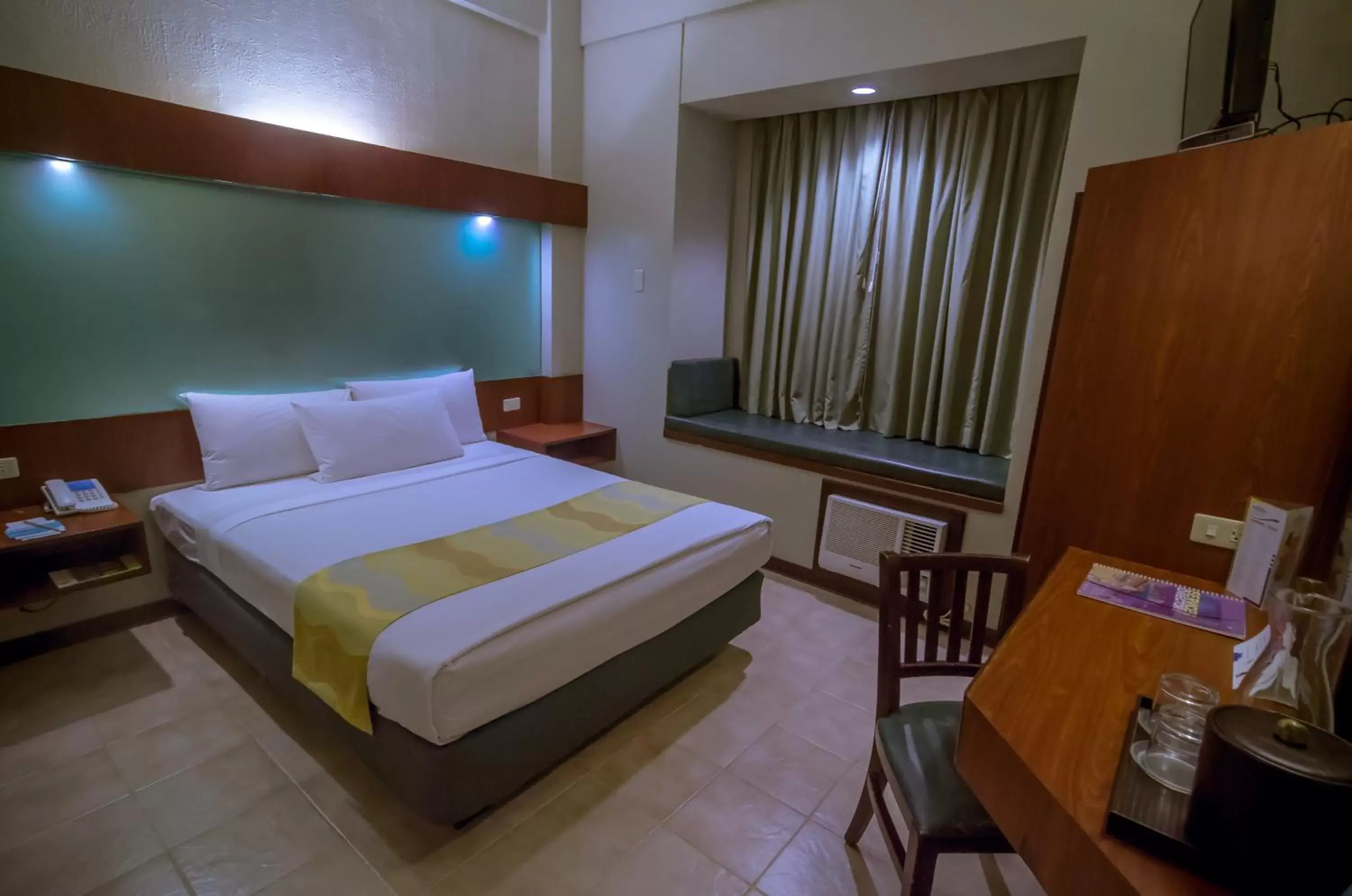 Photo of the whole room, Bed in Microtel by Wyndham Tarlac