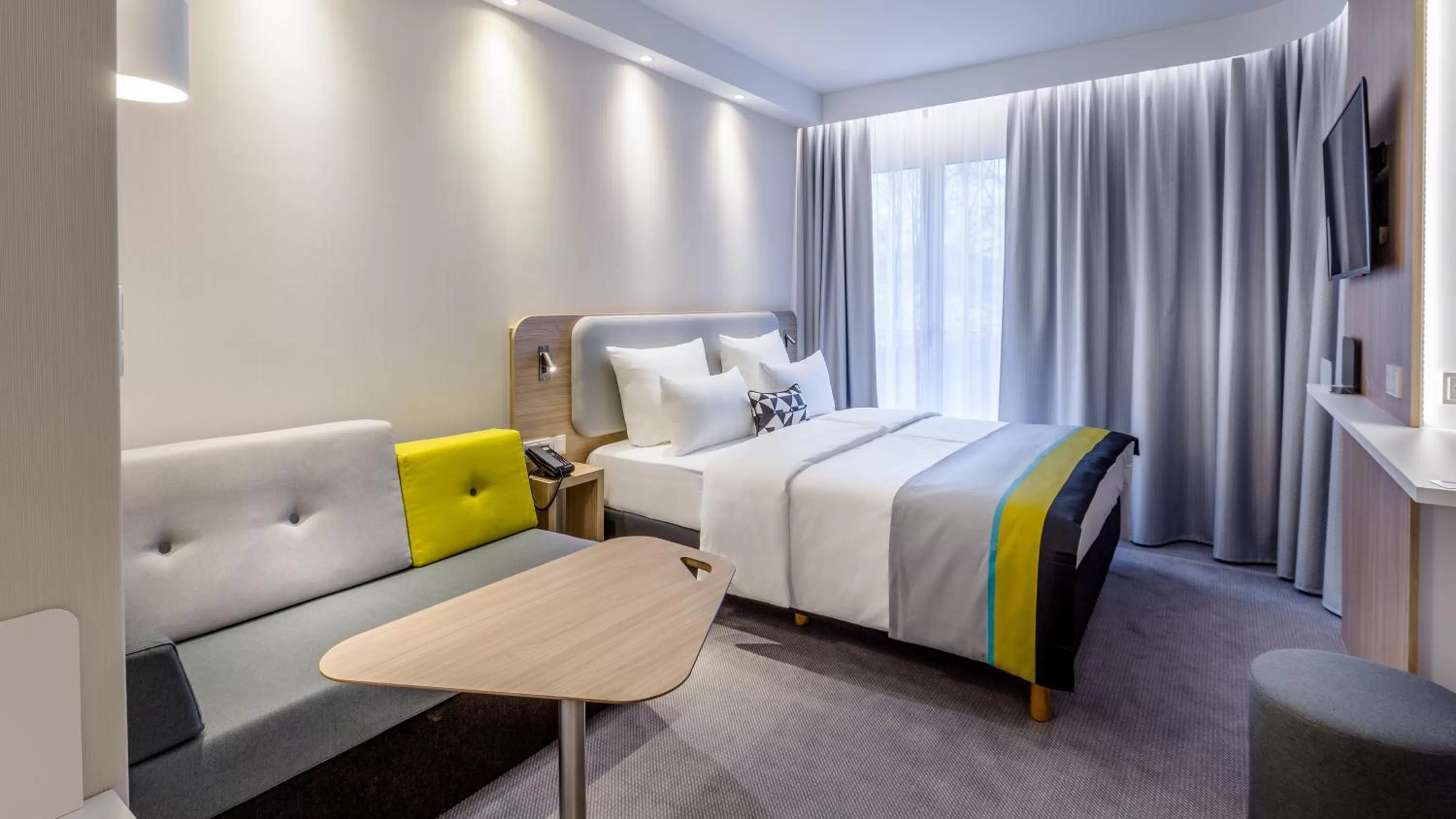 Photo of the whole room, Bed in Holiday Inn Express Munich - City East by IHG