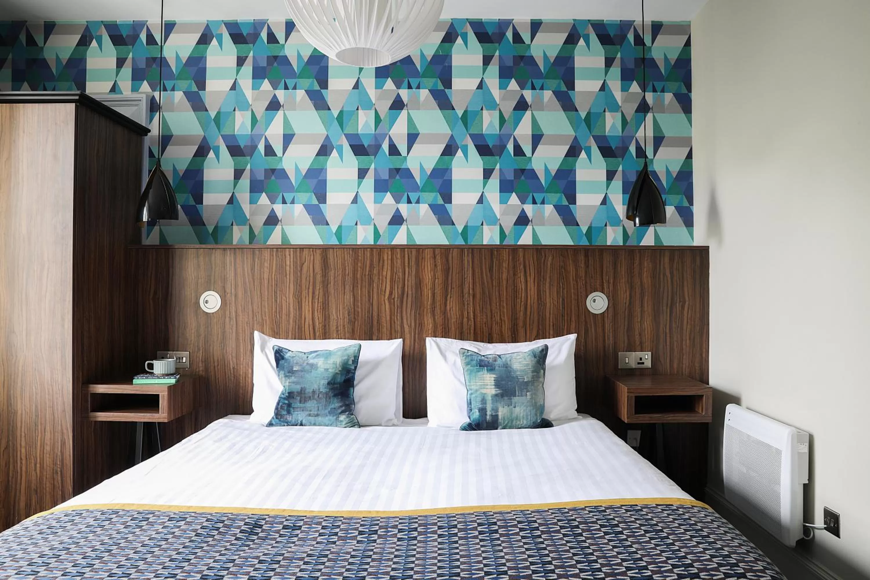 Bed in Cairn Hotel & Apartments