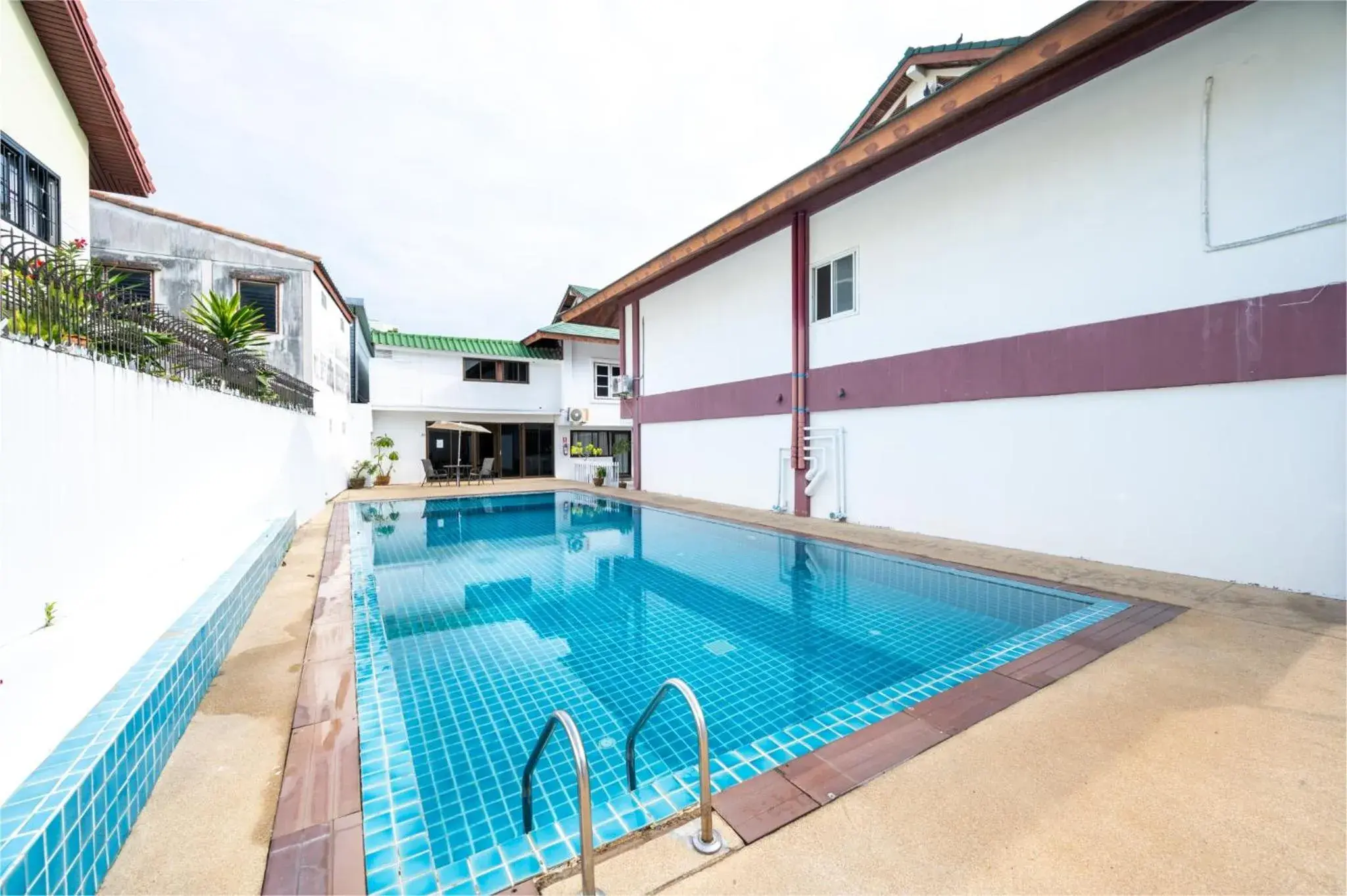 Property building, Swimming Pool in The President Hotel at Chokchai 4