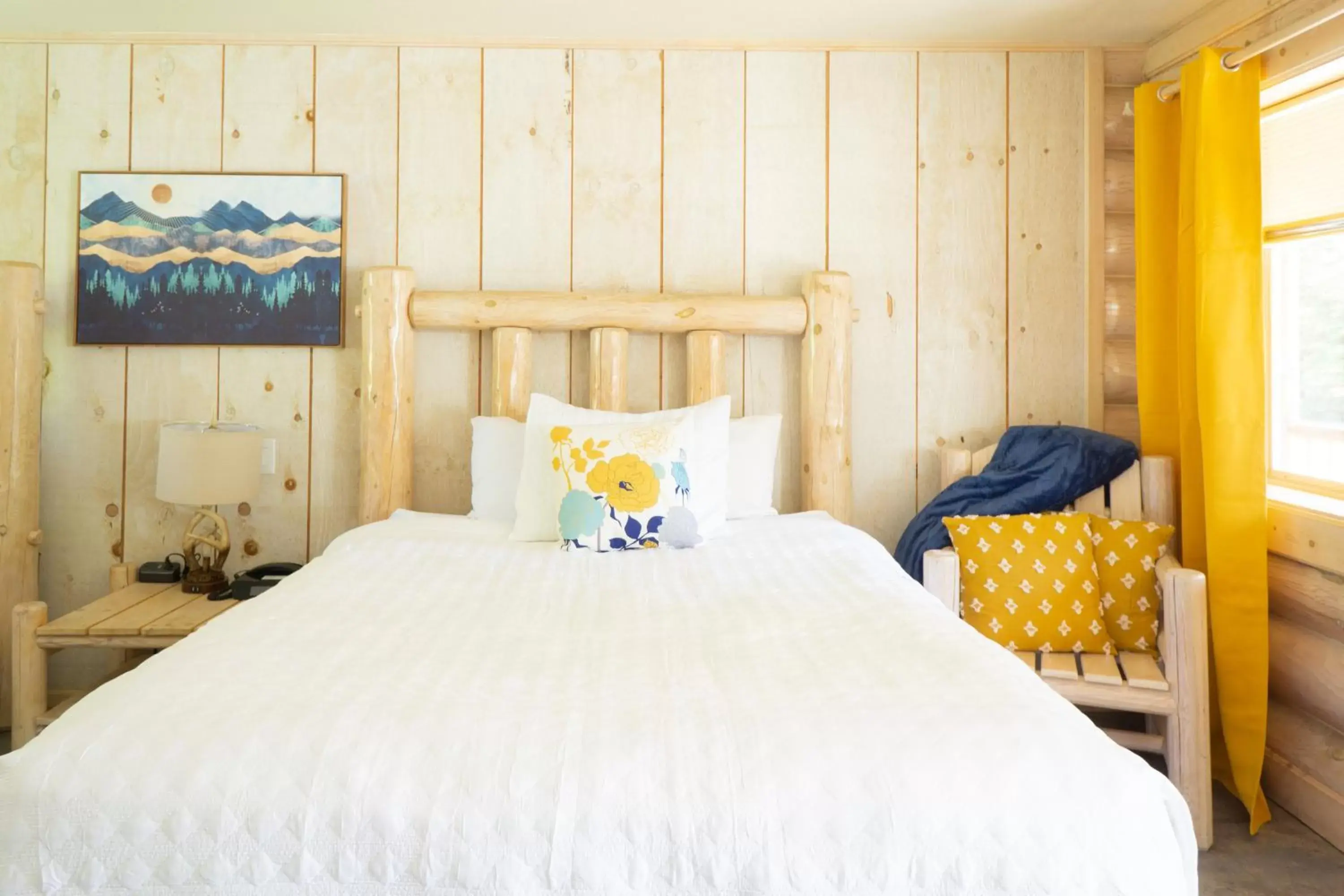 Bed in Log Inn Bonners Ferry