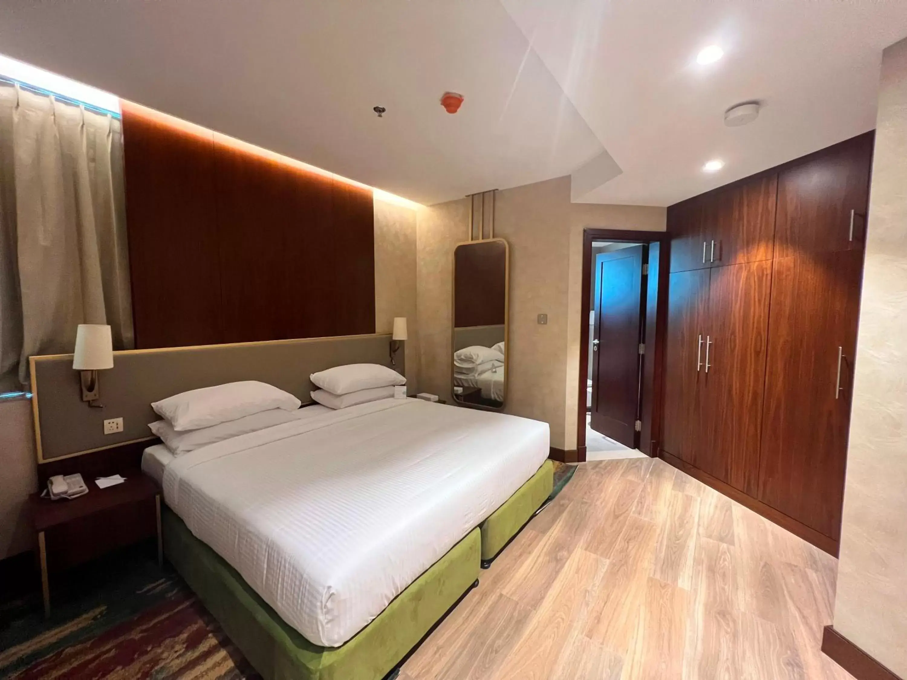 Bedroom, Bed in City Seasons Suites