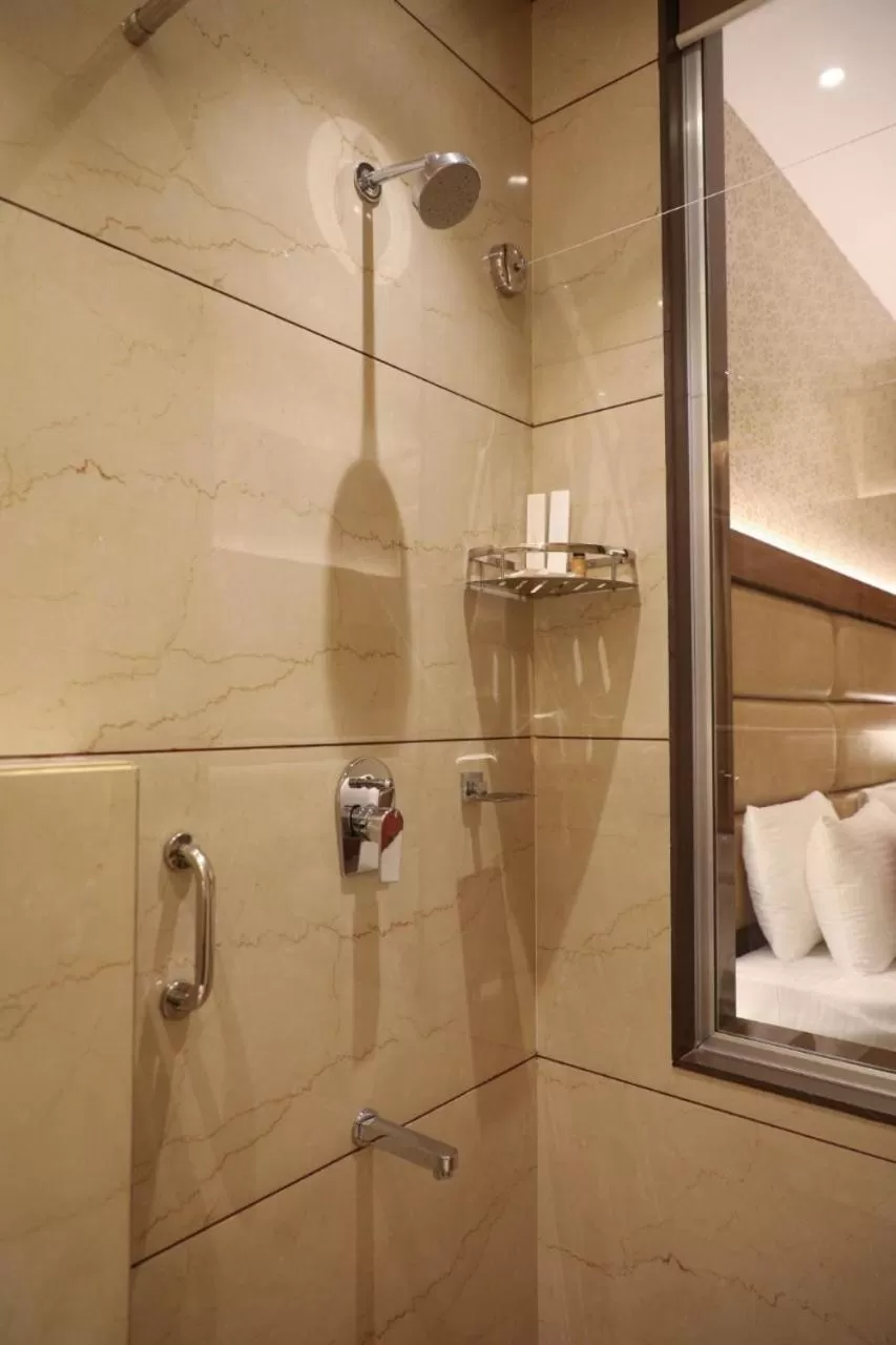 Shower, Bathroom in Hotel Gurudev Grand