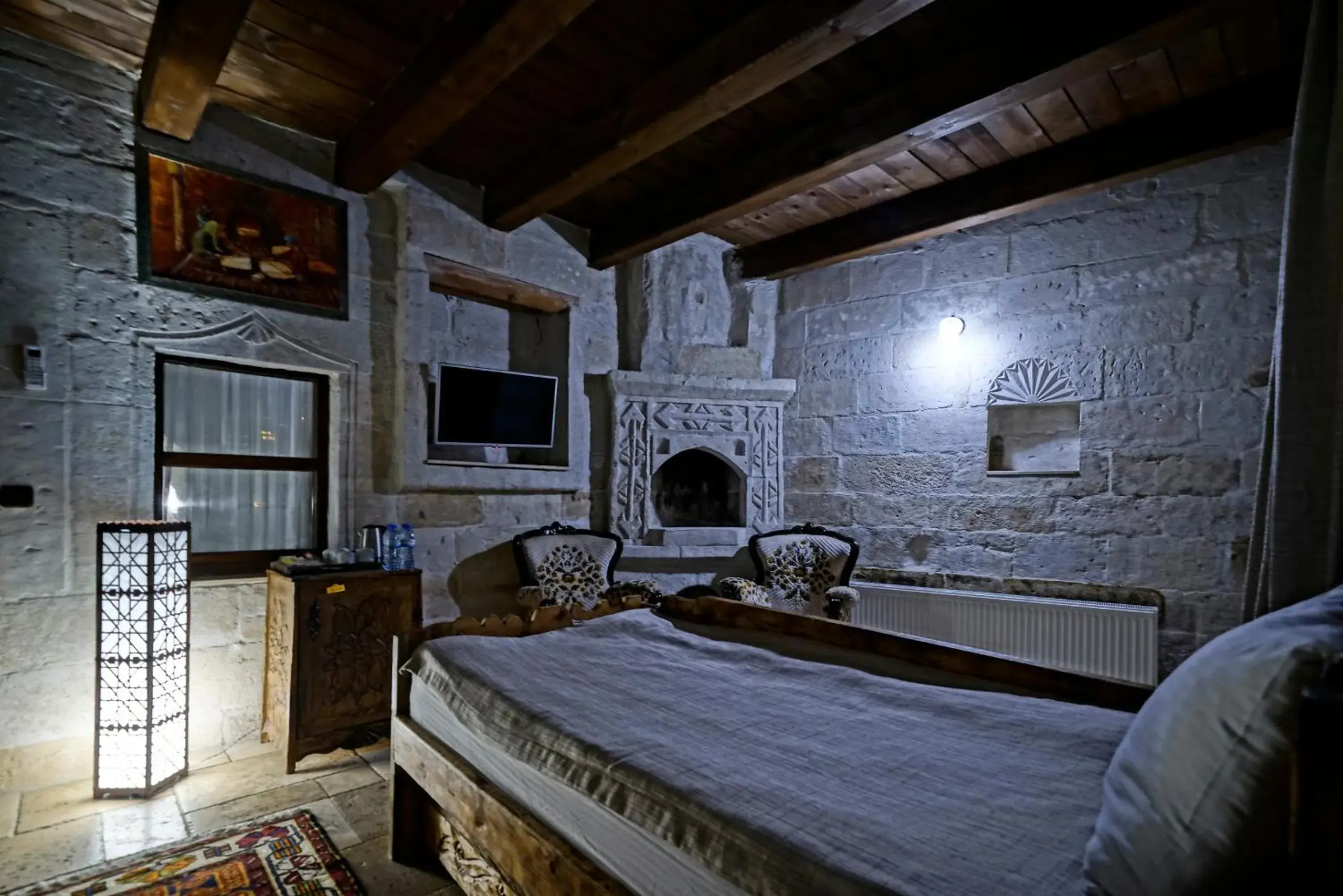 Bed in Holiday Cave Hotel