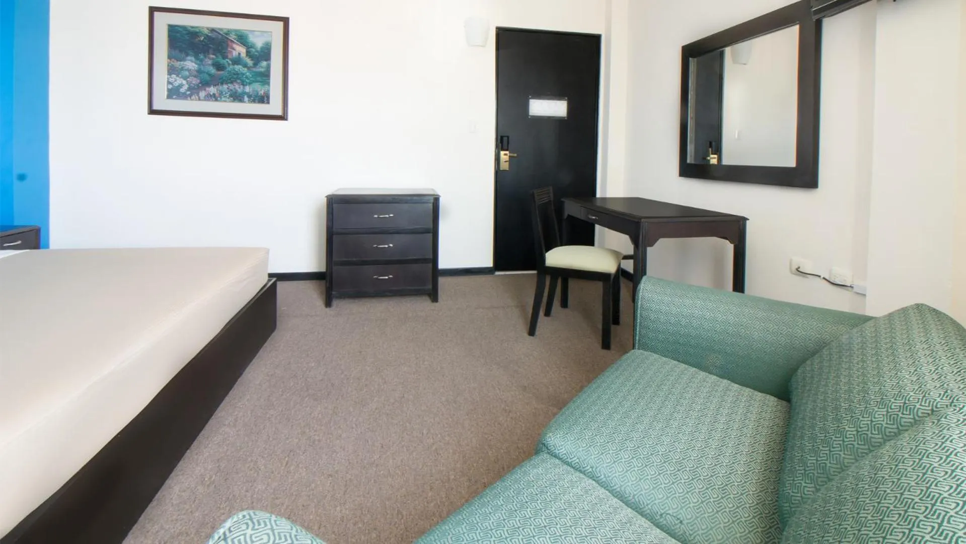 Living room in CHN Hotel Monterrey Santa Fe