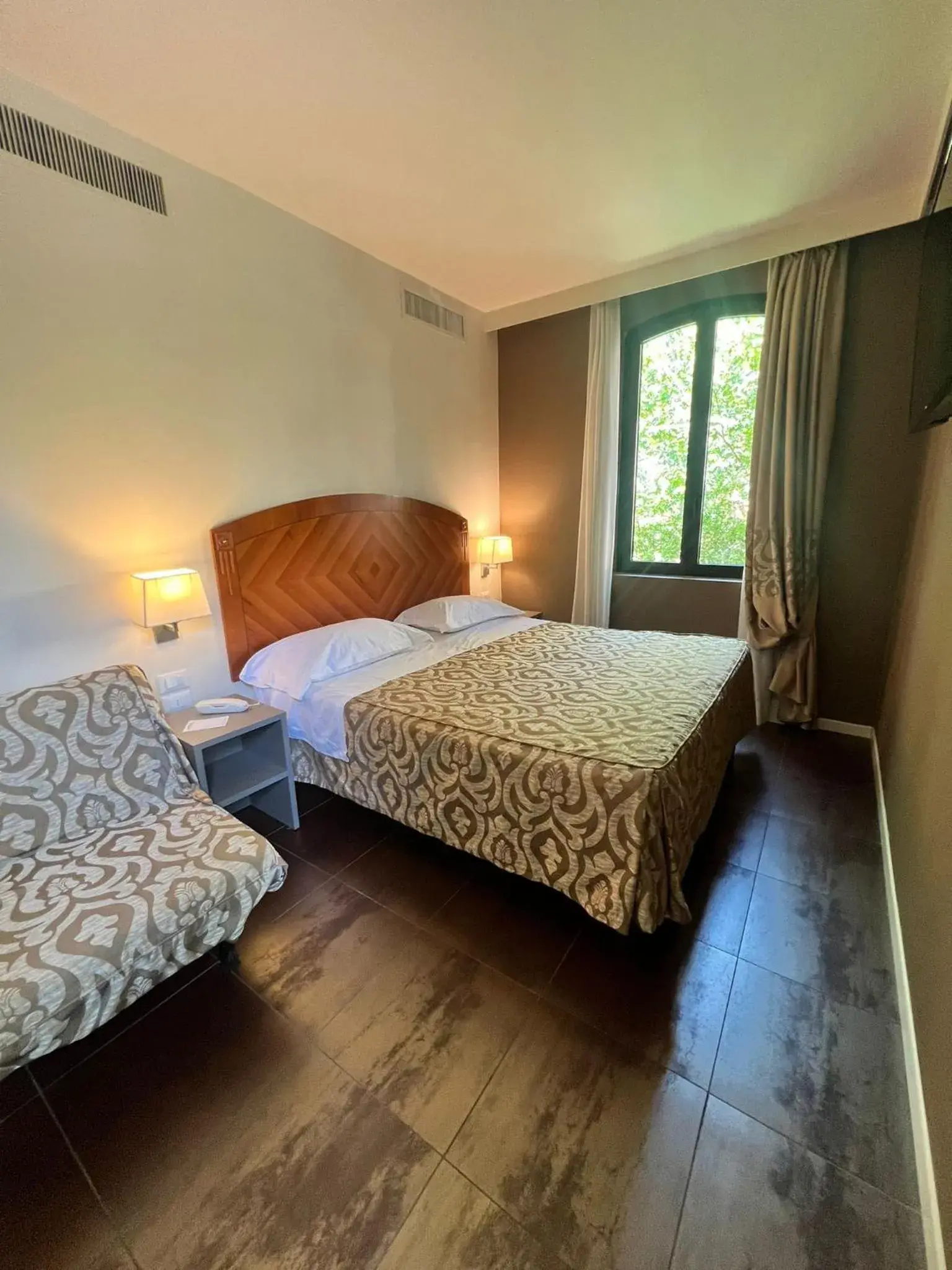 Bedroom, Bed in Savoia Hotel Country House Bologna