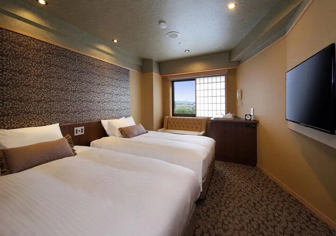 Bed in Hakodate Hotel Banso