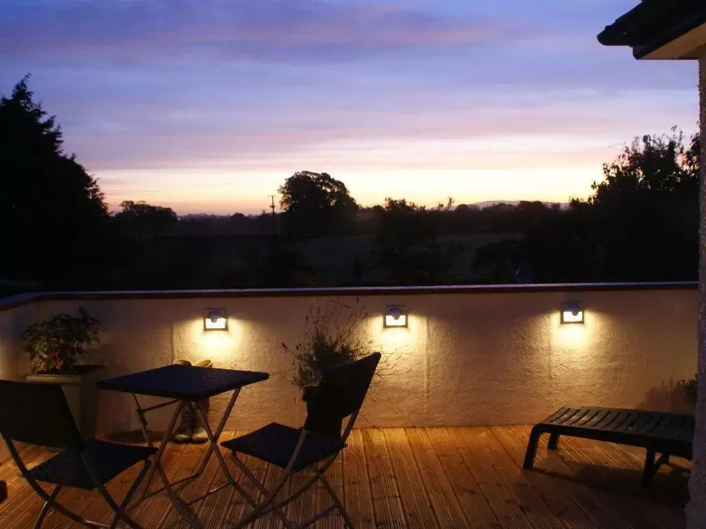 Balcony/Terrace, Sunrise/Sunset in Orchard Side Bed and Breakfast