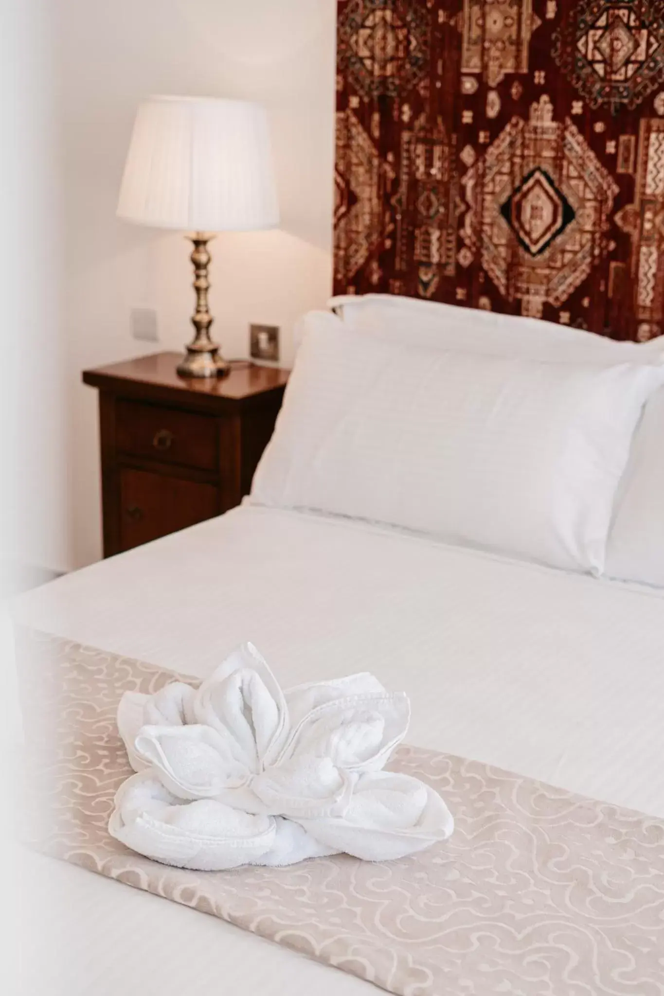 Bed in Palazzo Violetta Boutique Hotel