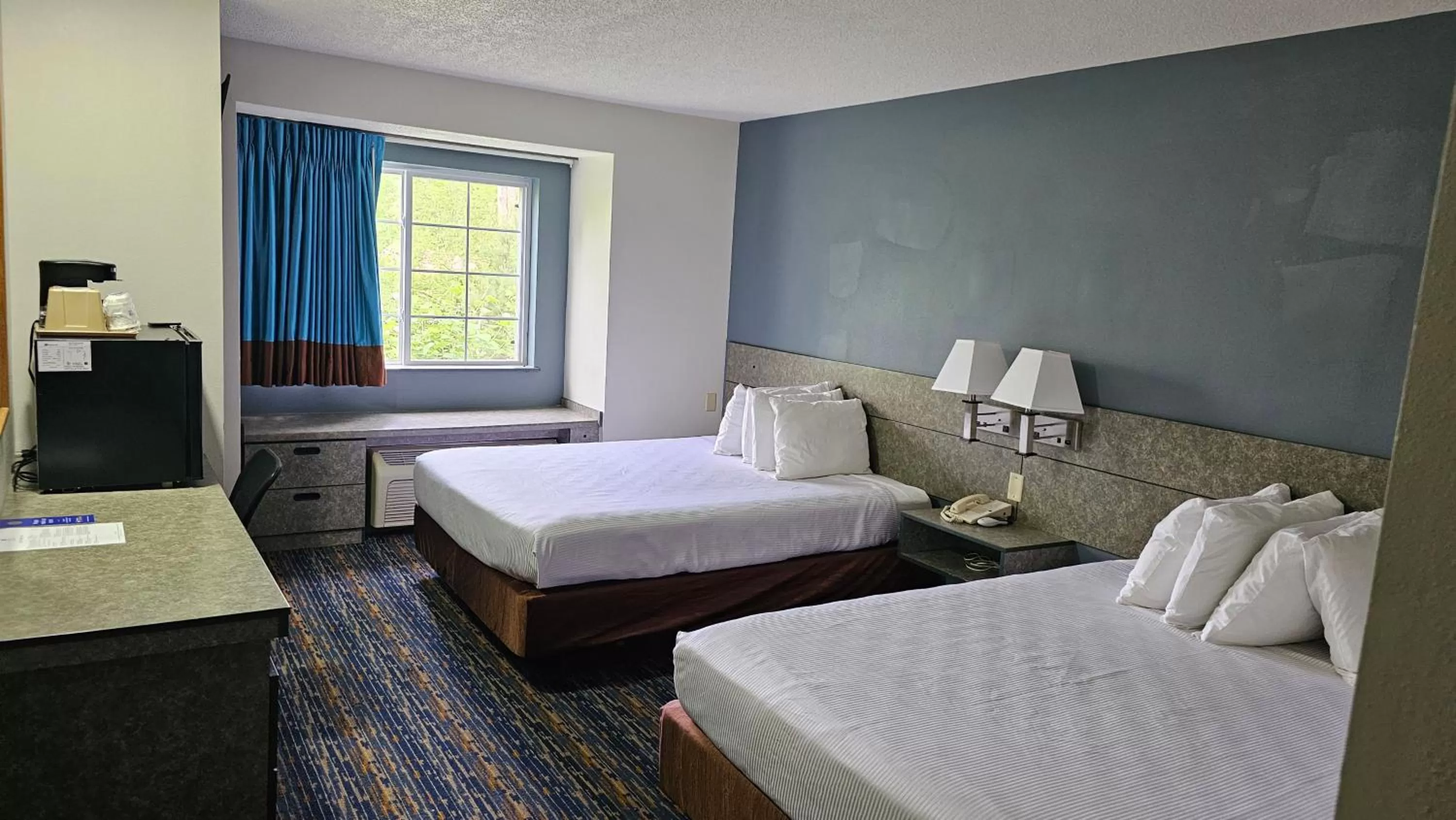 Photo of the whole room, Bed in MJ INN and SUITES