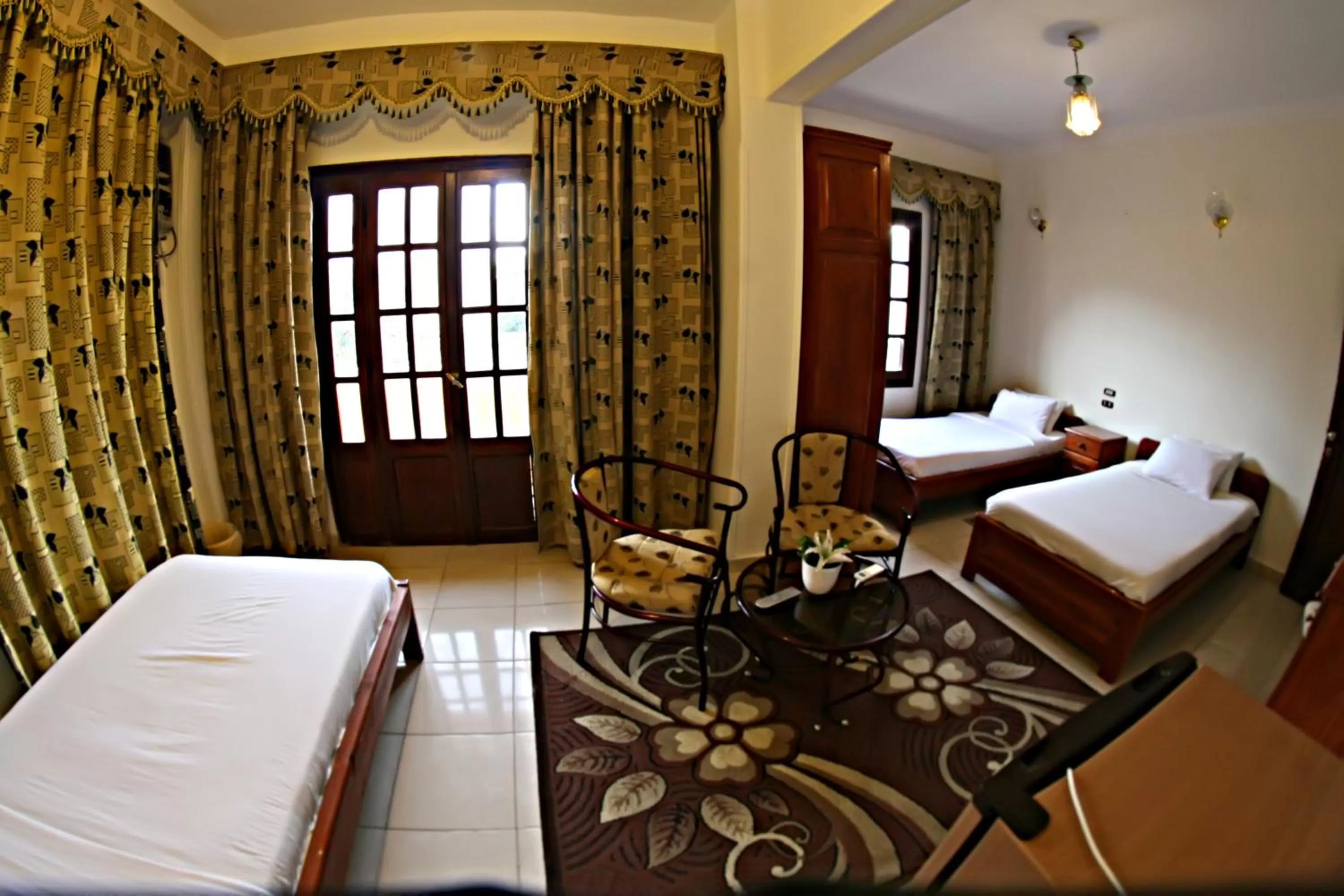 Photo of the whole room, Bed in Luxor Hotel Hurghada