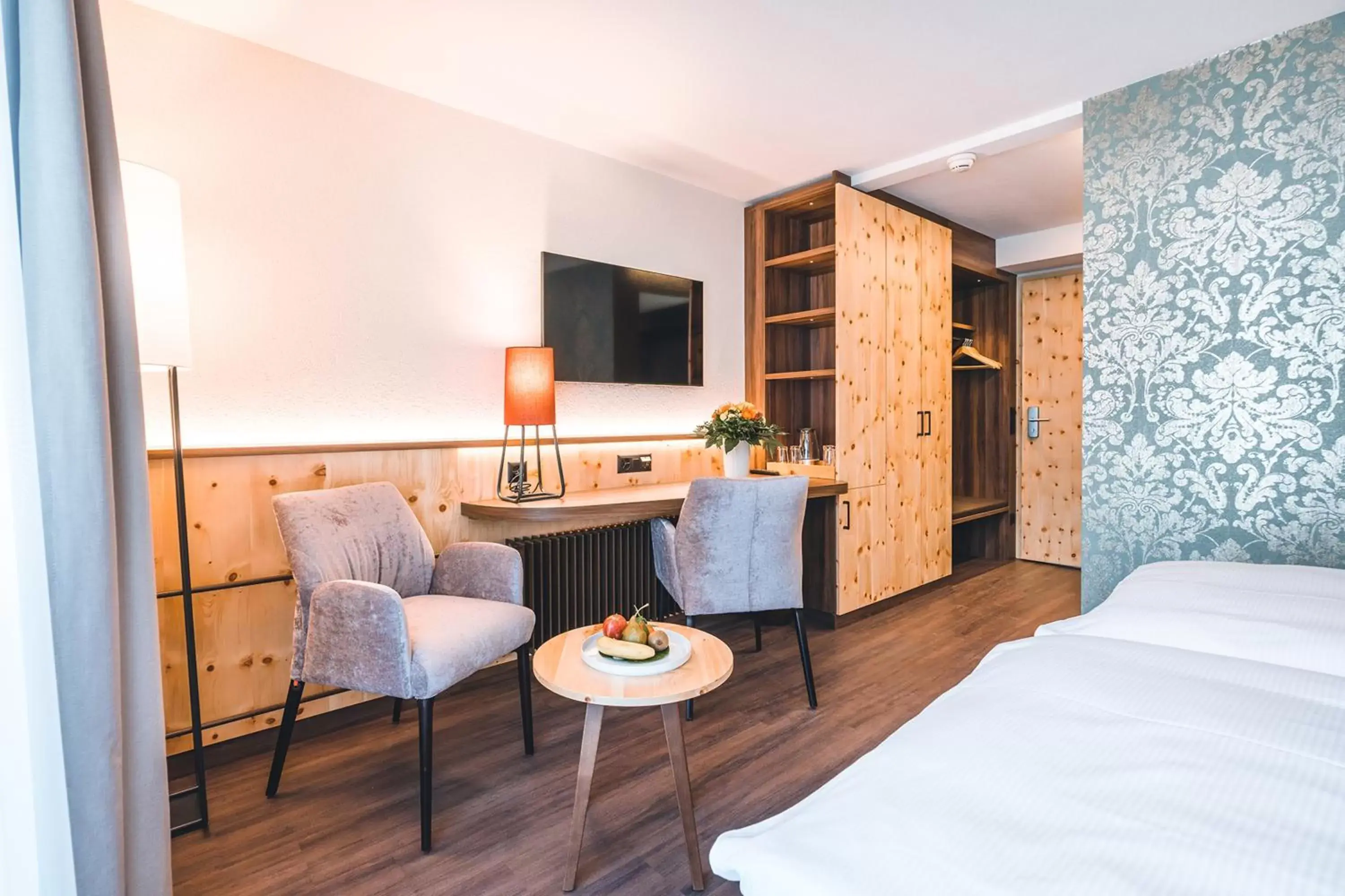 Seating area, Bed in Hotel Laudinella Seating area, Bed in Hotel Laudinella