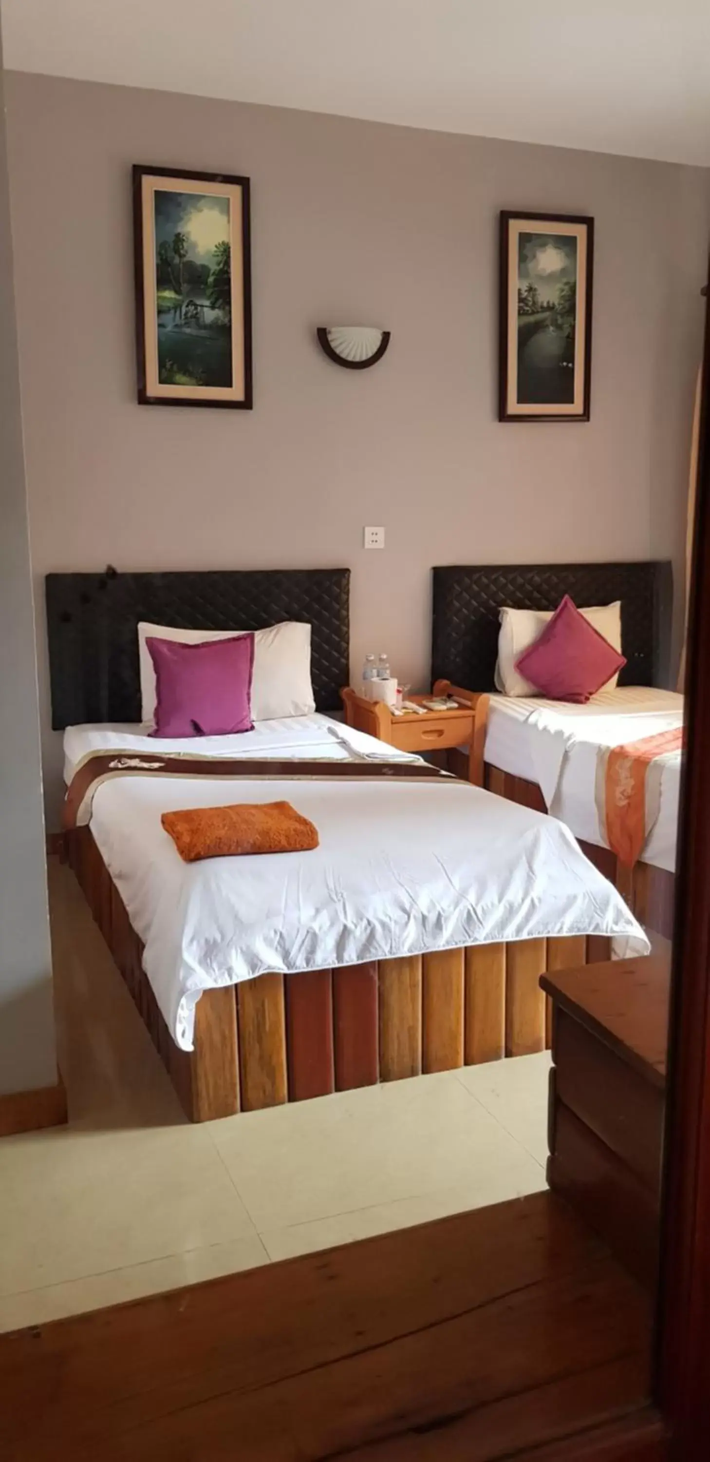 Seating area, Bed in Apex Koh Kong Hotel