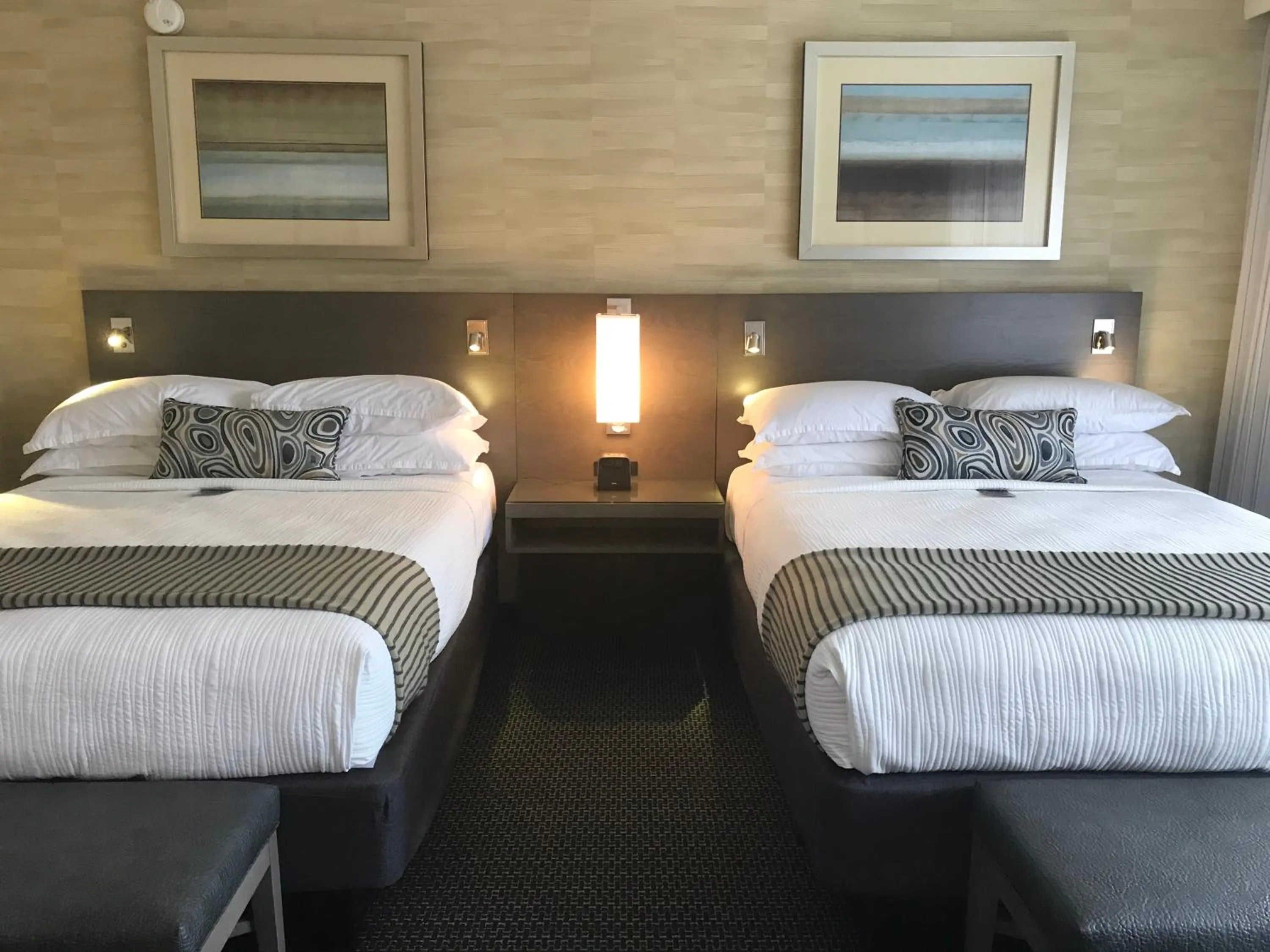 Bedroom, Bed in West Beach Inn, a Coast Hotel