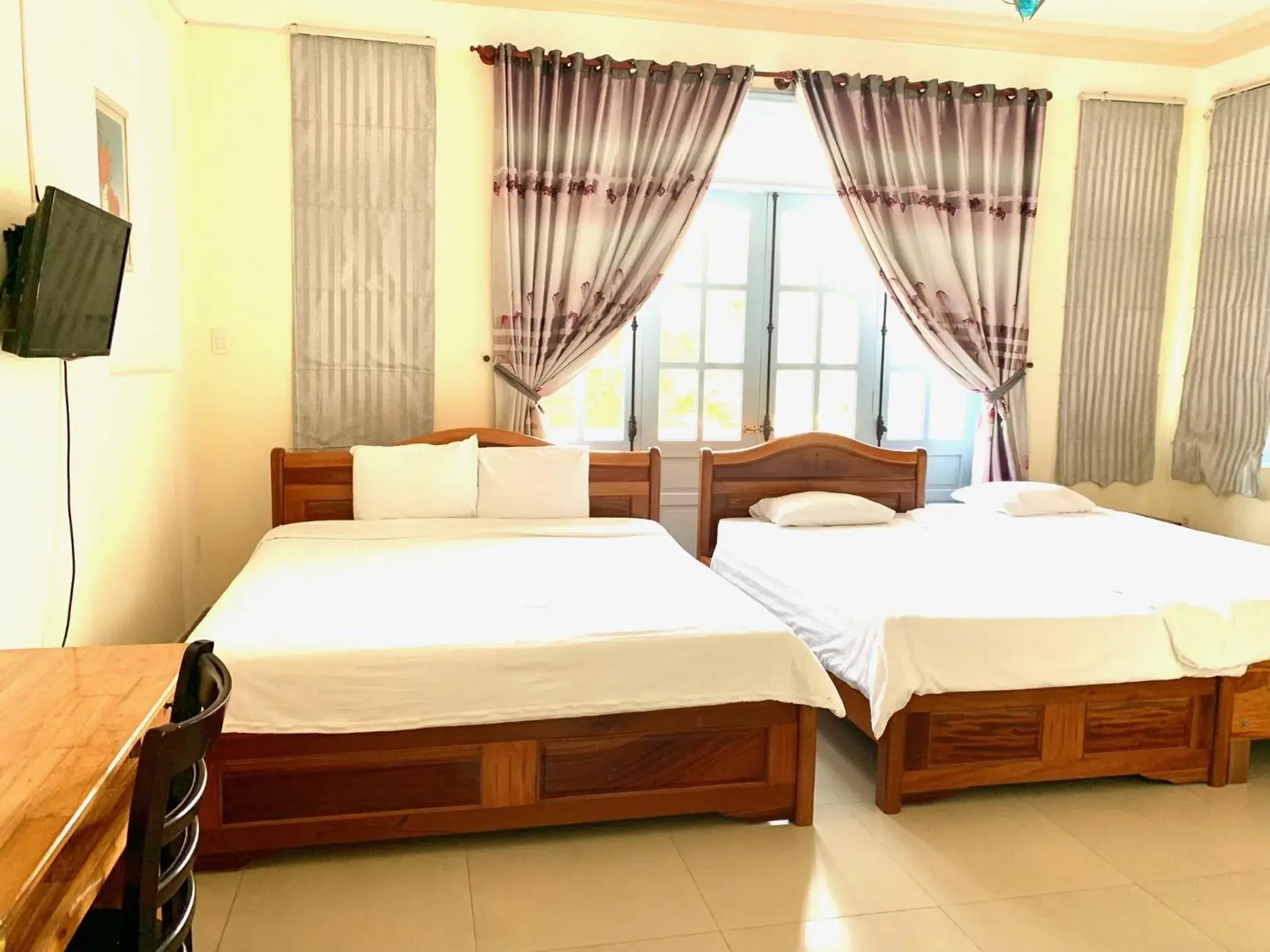 Bed in Areca Homestay