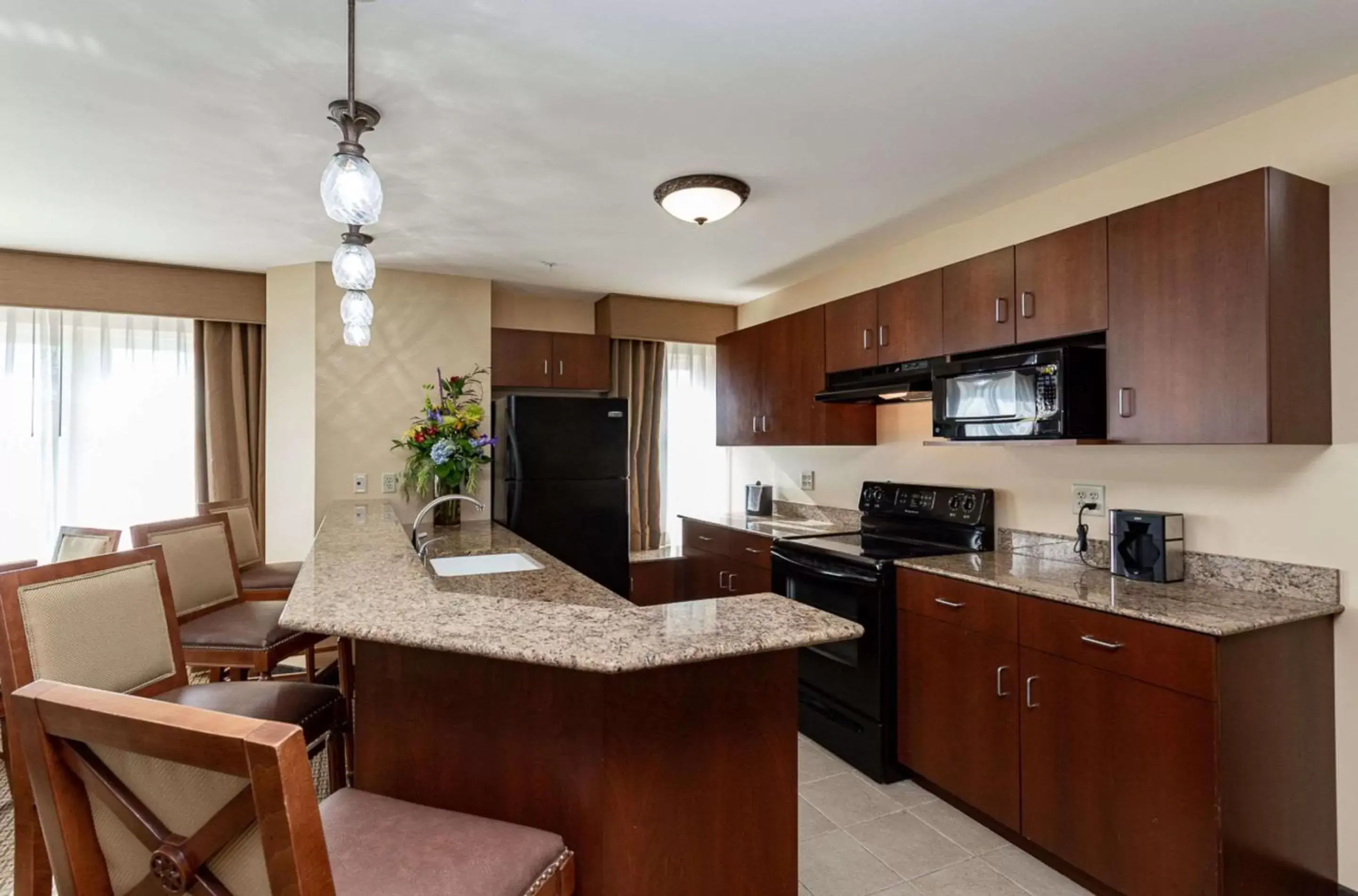 Kitchen or kitchenette, Kitchen/Kitchenette in Jefferson Street Inn, a Member of Radisson Individuals