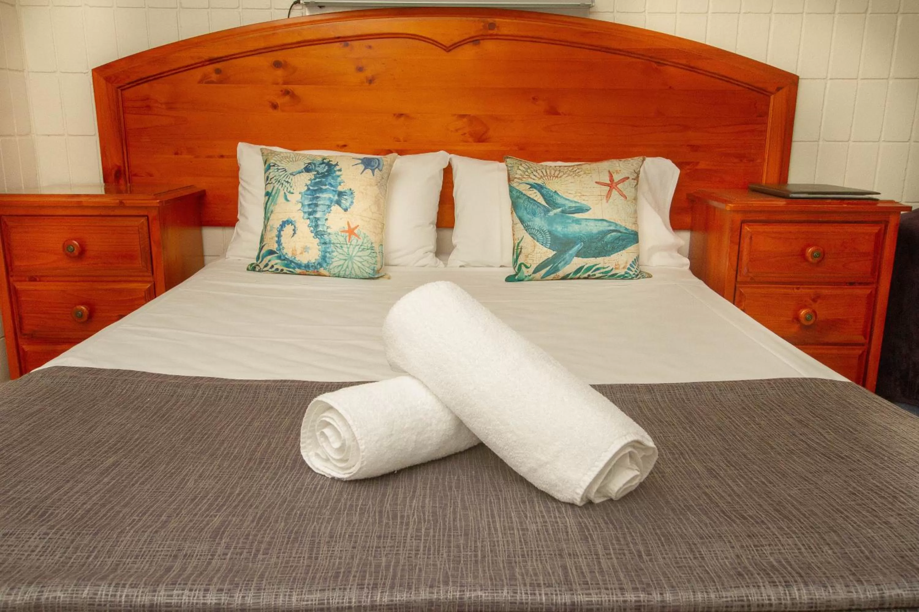 Bed in Tropical Palms Resort & 4WD Hire