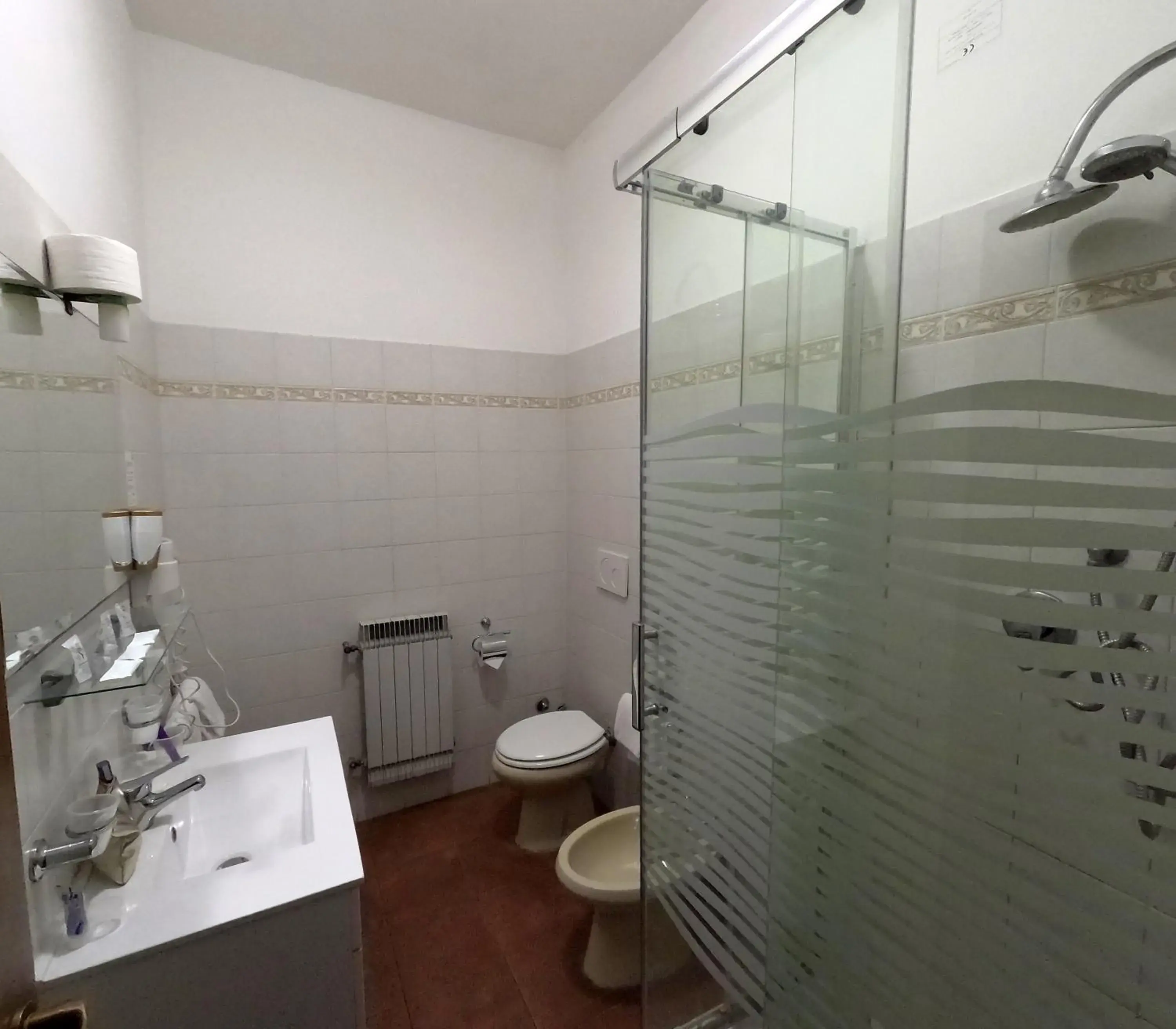 Bathroom in ROMA ROOM HOTEL