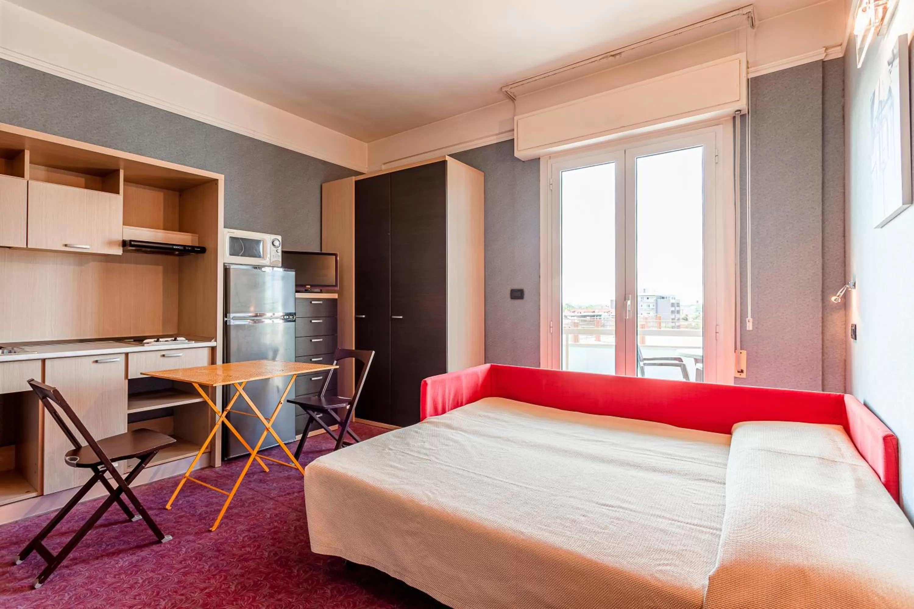 Photo of the whole room, Bed in Residence & Suites