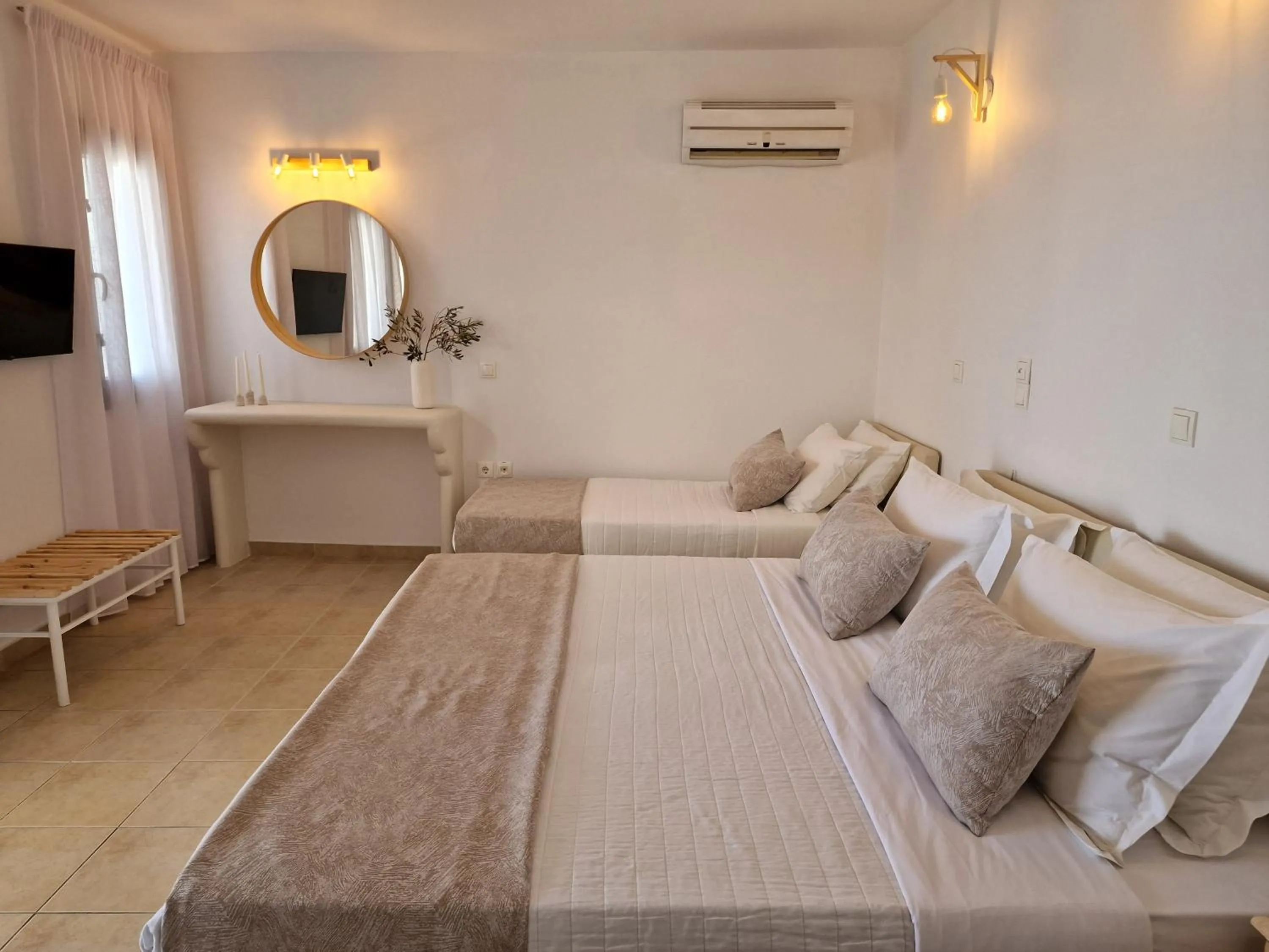 Bedroom in Amerisa Suites & Villa