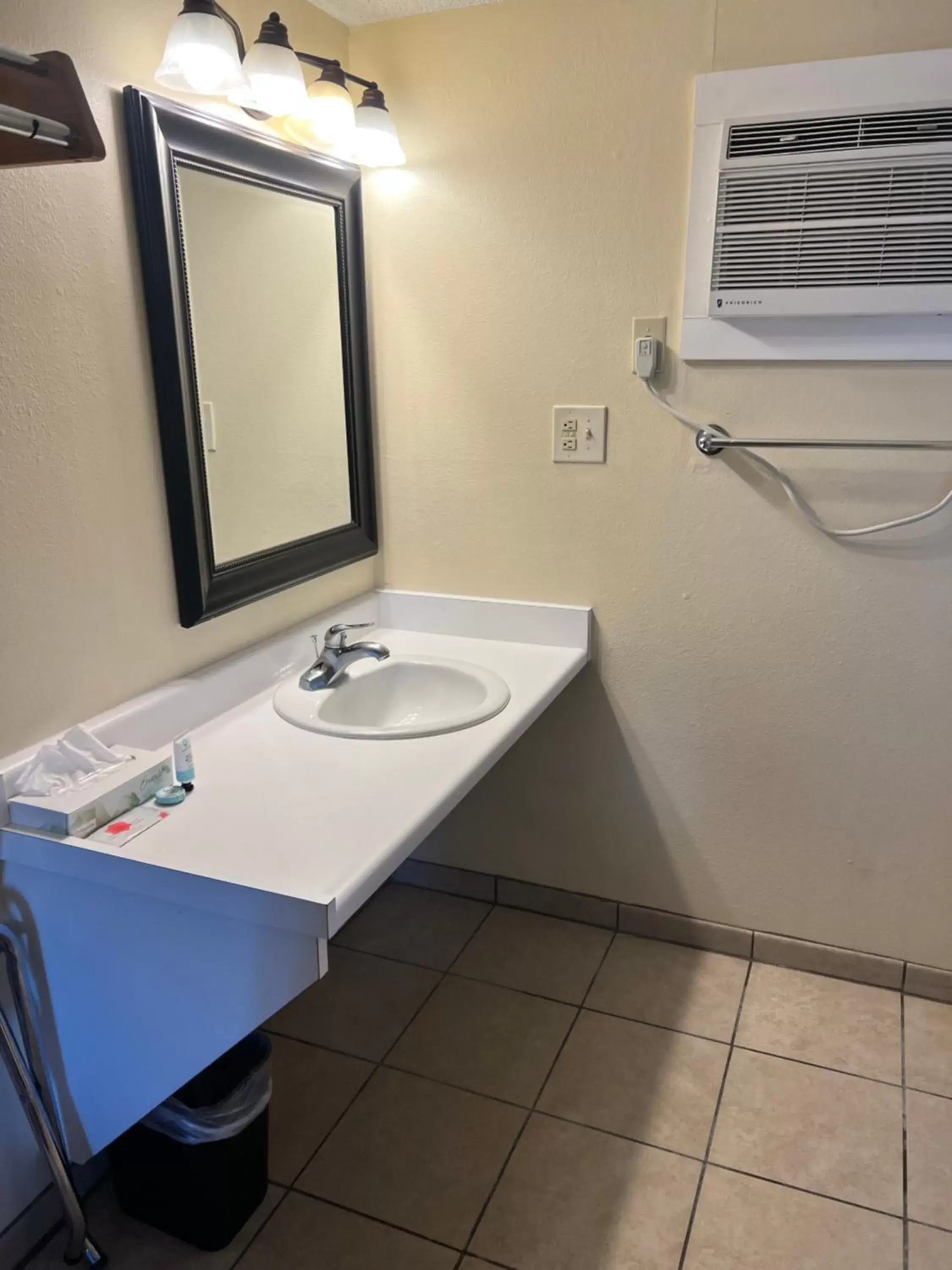 Bathroom in Timbers INN and Suites