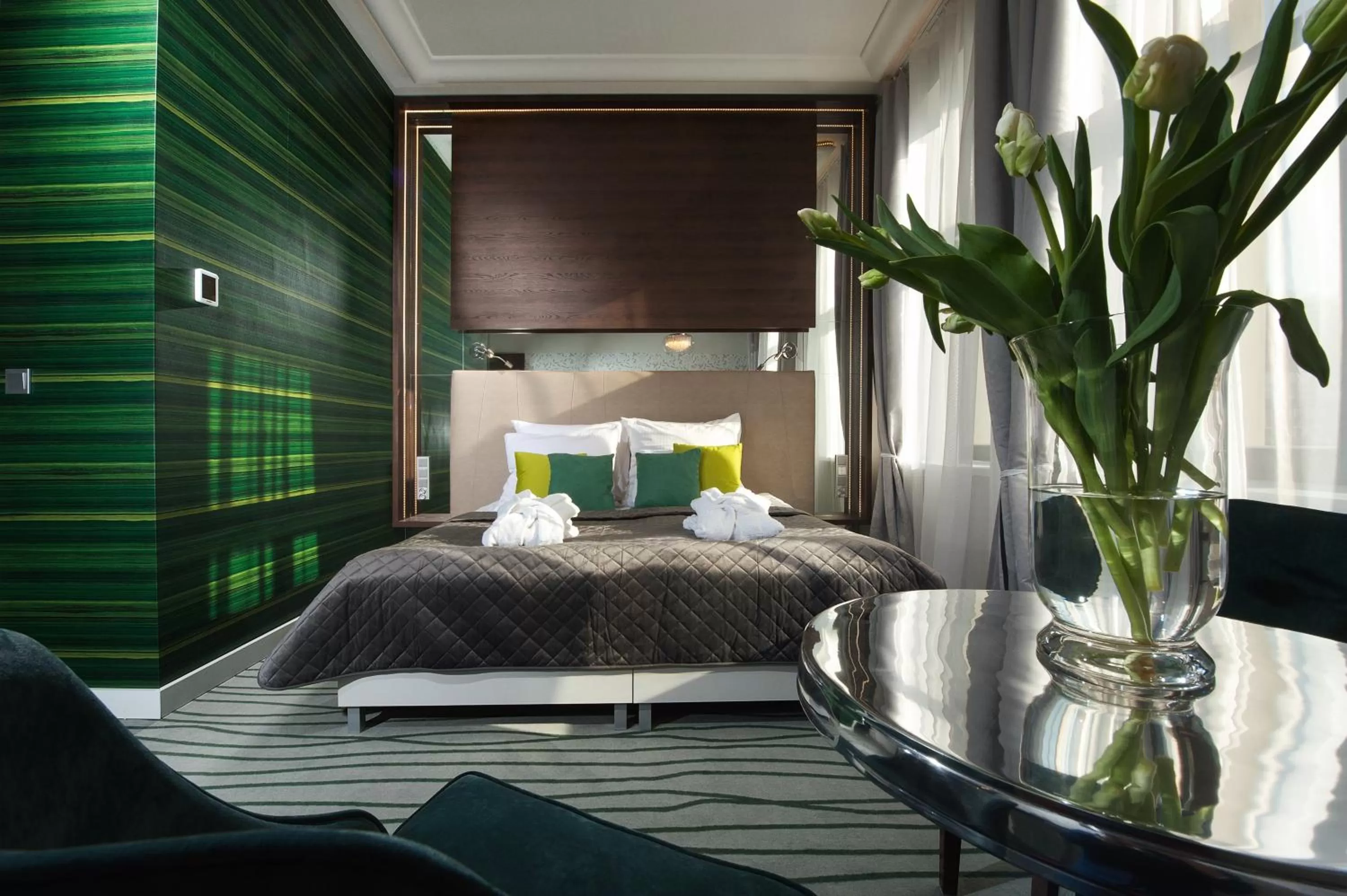 Bed in Plaza Boutique Hotel