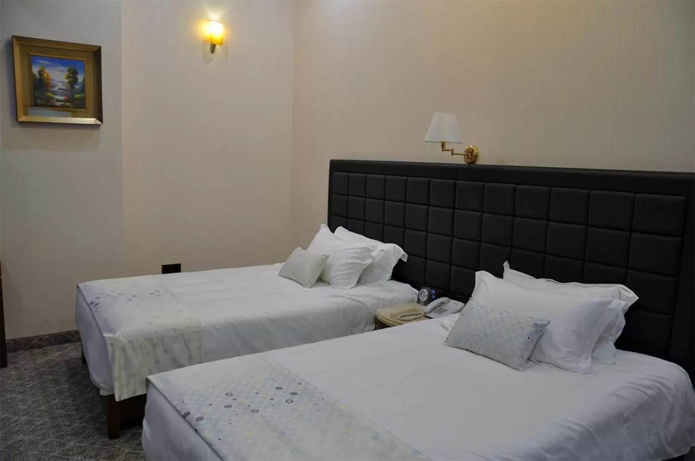 Bed in Parliament Palace Hotel