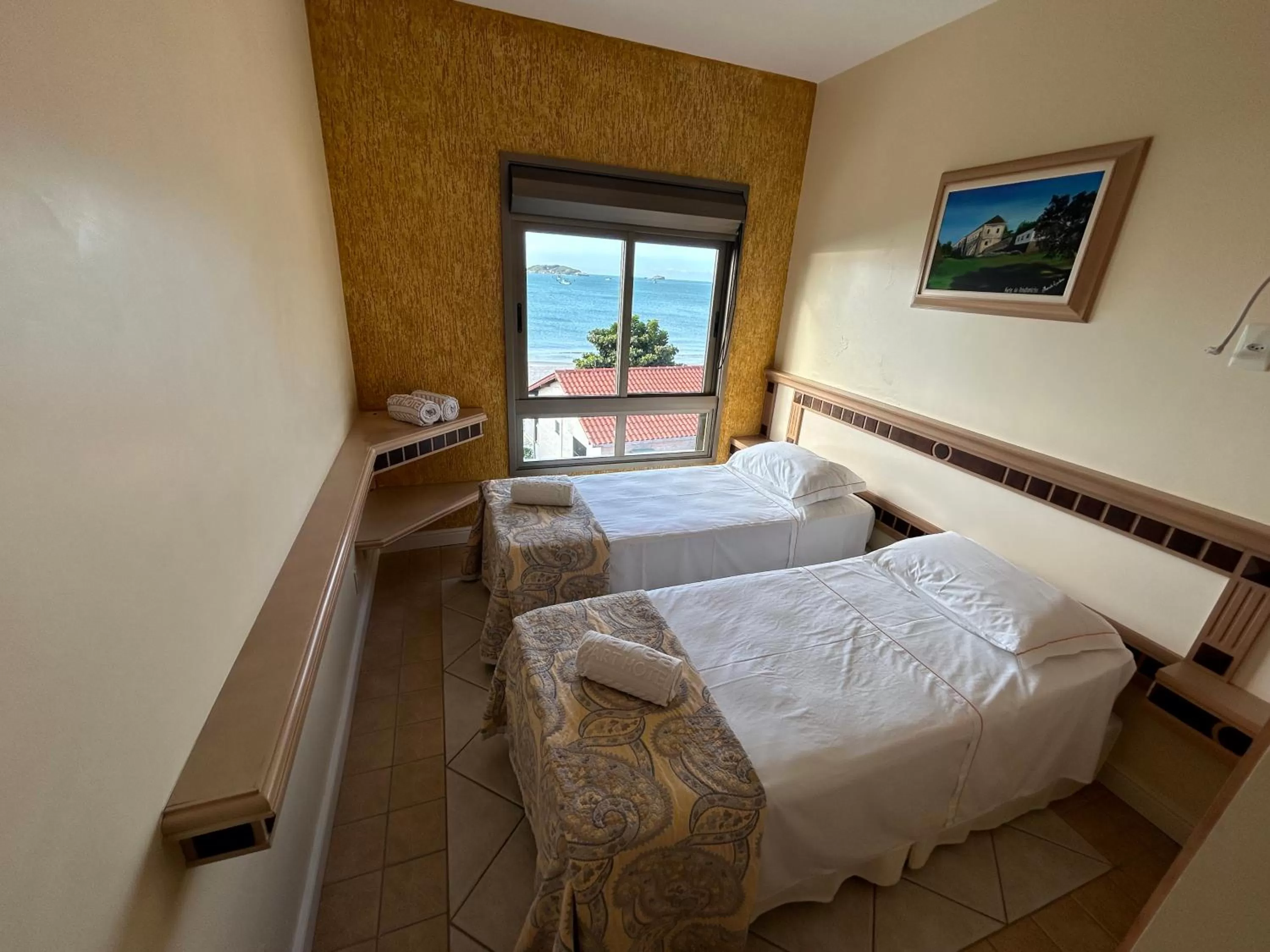 Bed in Golfinhos Apart Hotel