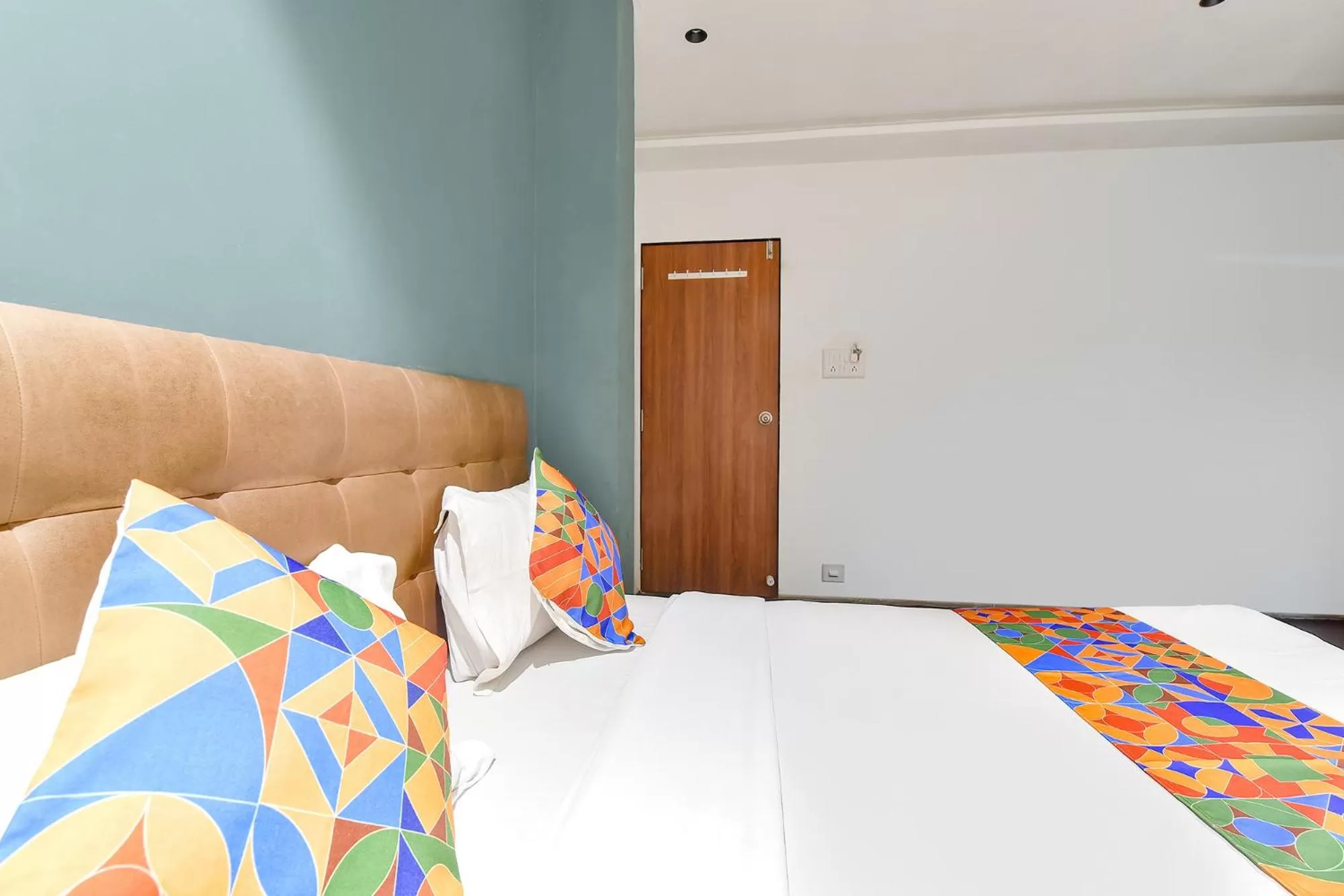 Bed in FabHotel Nidhivan, Udhna Junction