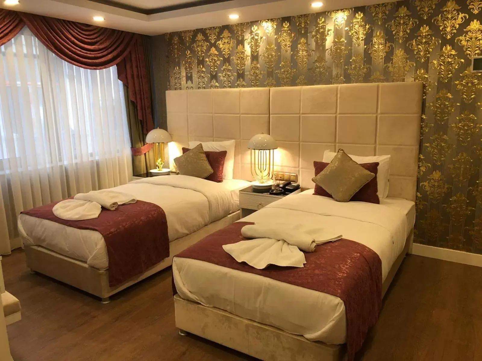Photo of the whole room, Bed in Burj Al Istanbul