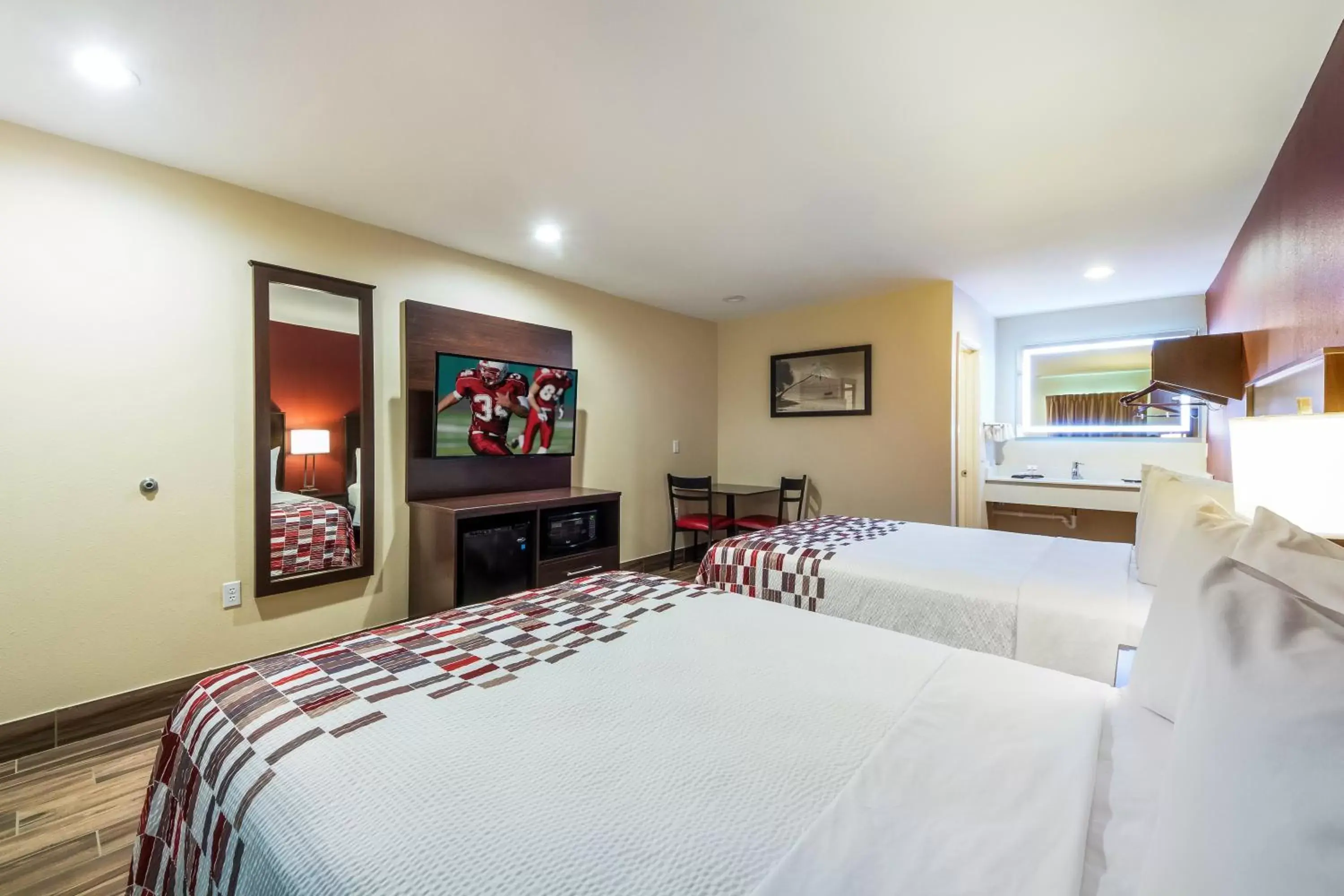 Photo of the whole room, Bed in Ocean's Edge Hotel, Port Aransas,TX