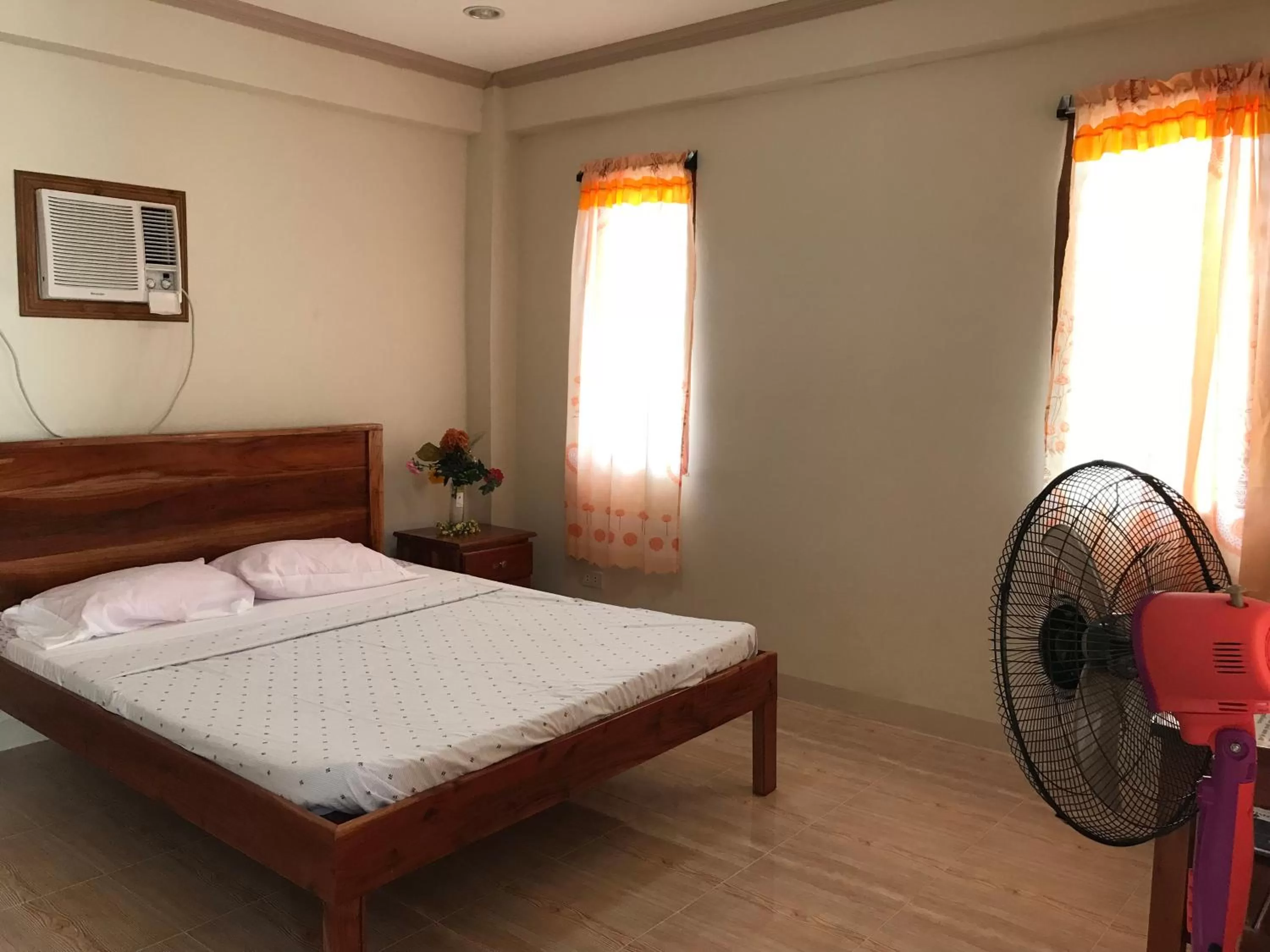 Bed in D's Oceanview Beach Resort