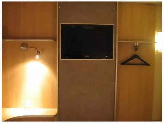 TV and multimedia, TV/Entertainment Center in Green Hôtels Orléans Nord-Saran