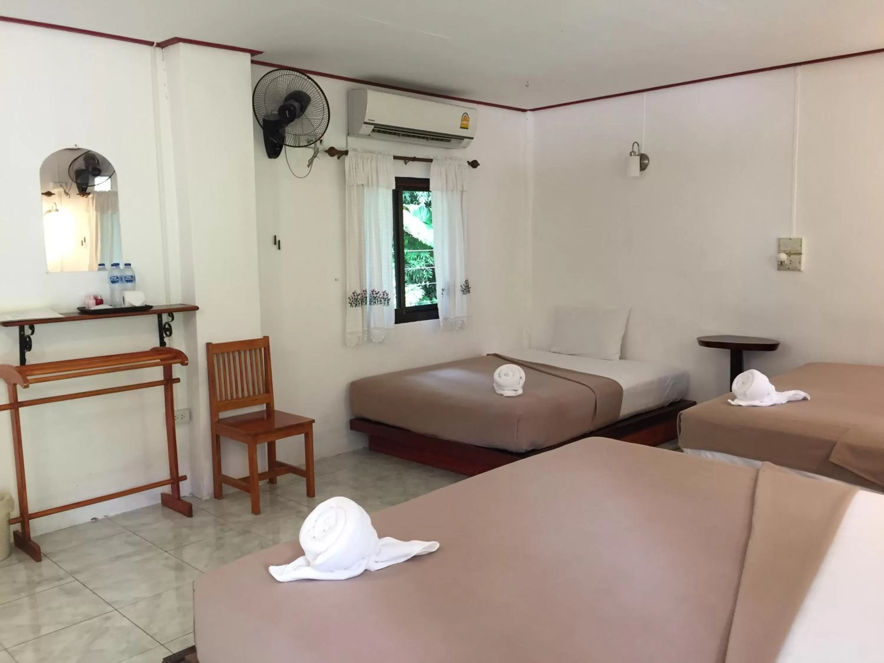 Bed in Khao Sok Jungle Huts Resort