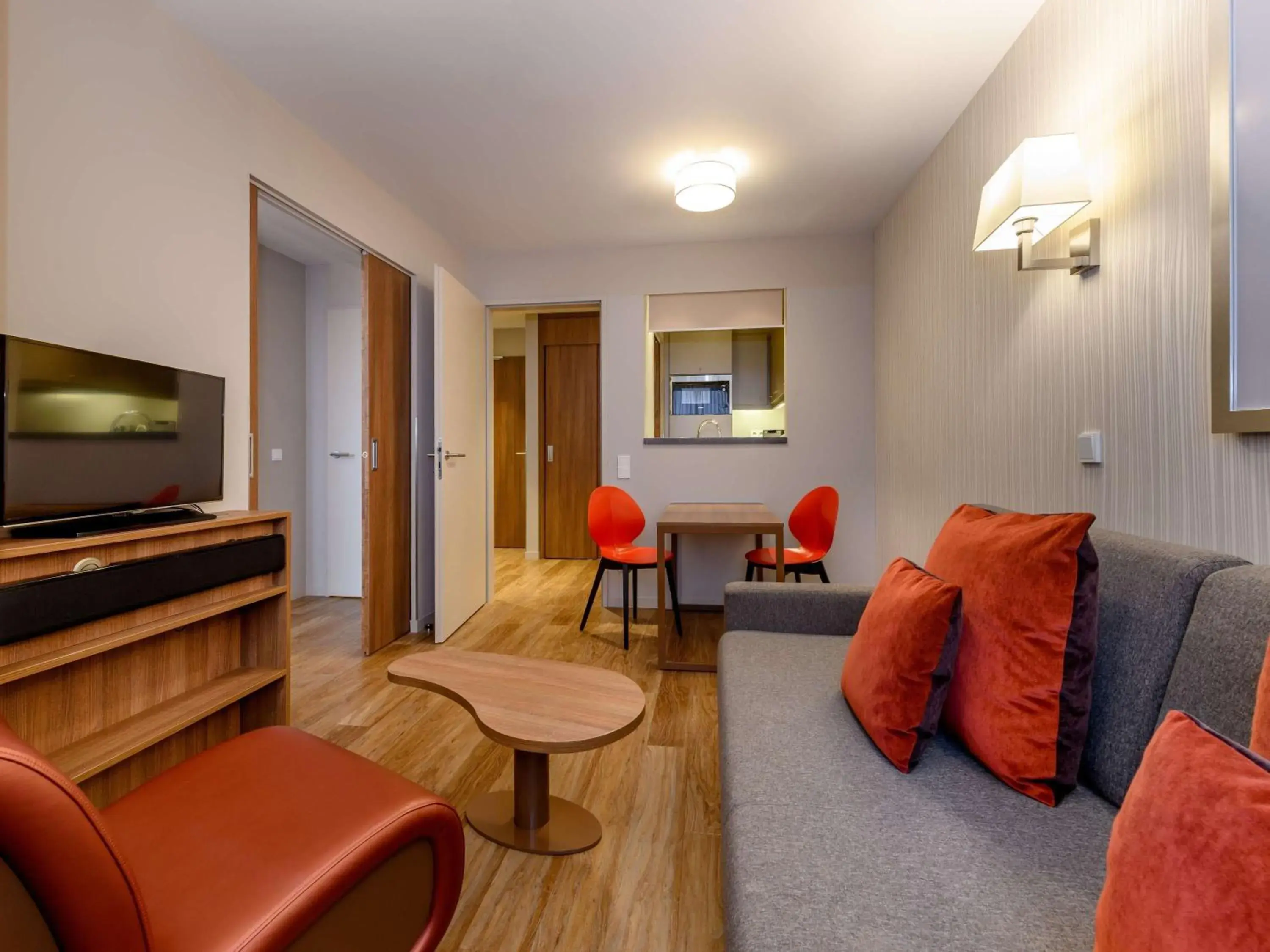 Bedroom, Seating Area in Aparthotel Adagio Frankfurt City Messe