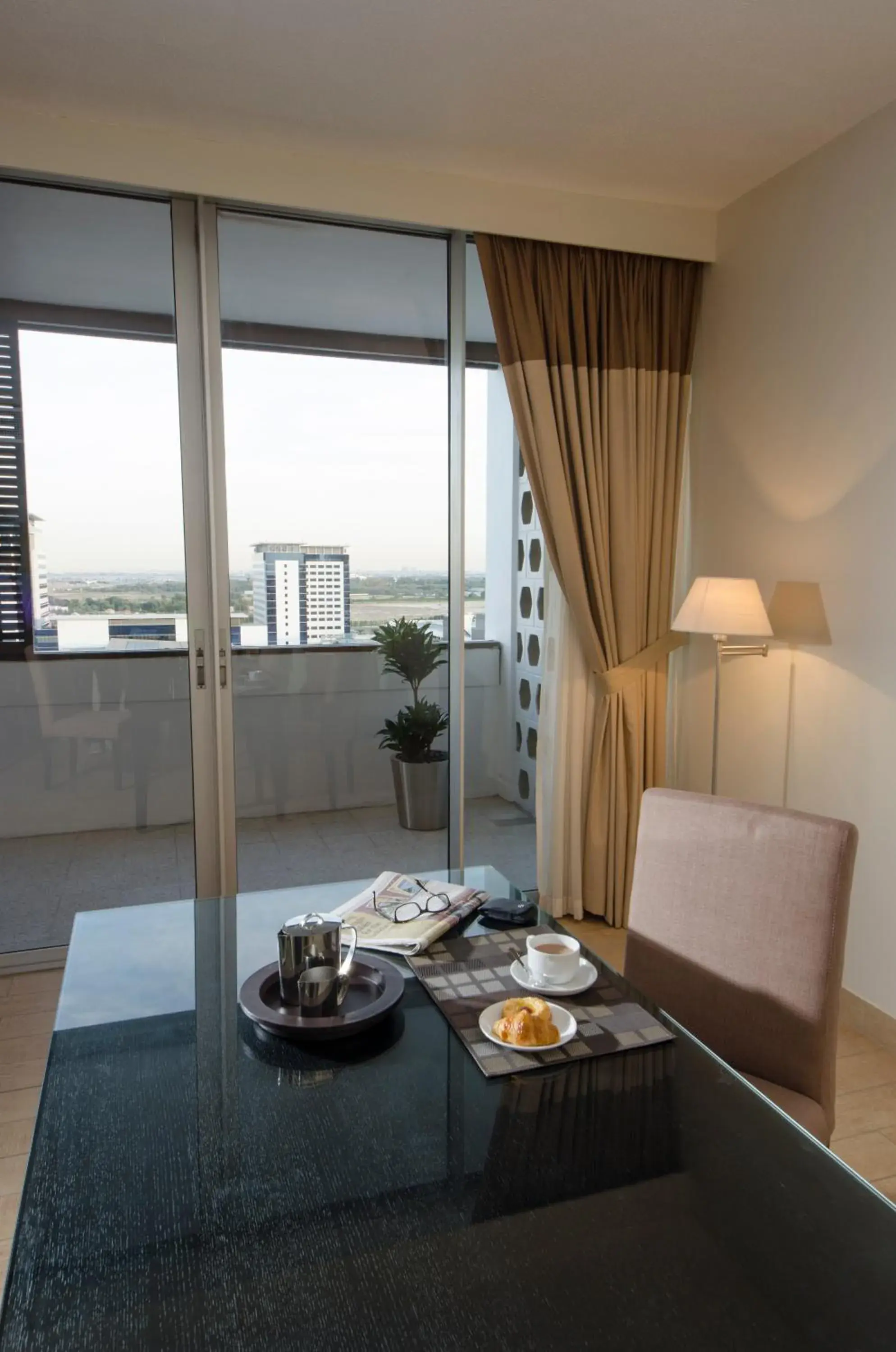 Dining area in The Apartments, Dubai World Trade Centre Hotel Apartments