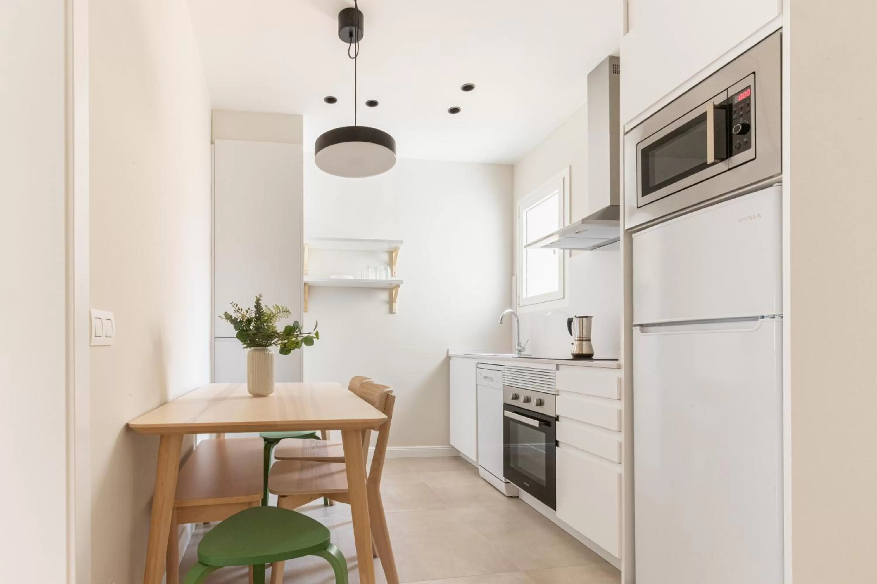 Kitchen or kitchenette in Atica Apartments - by Weflating