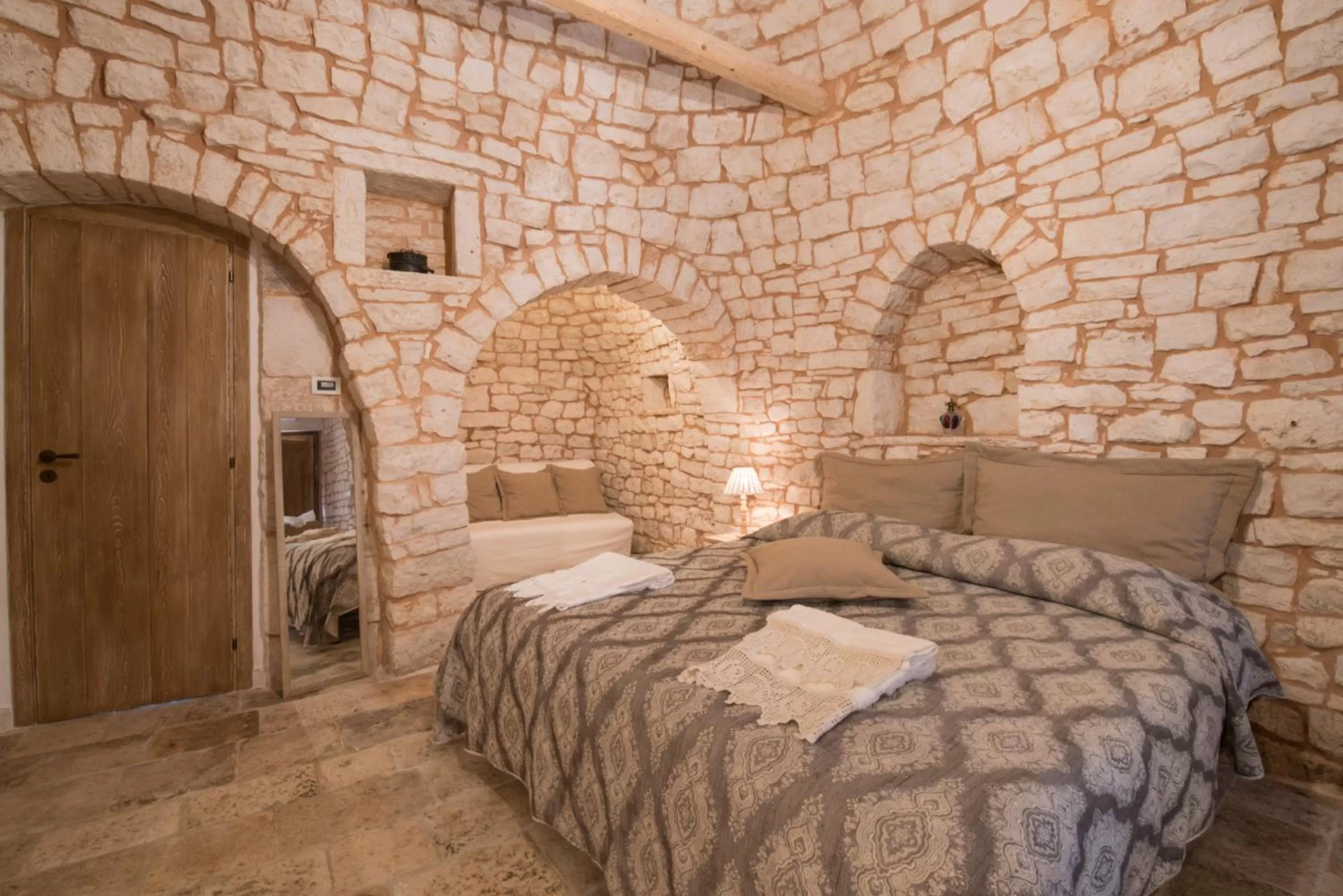 Bed in Trulli Antichi Mestieri - Widespread Trulli in the historic center