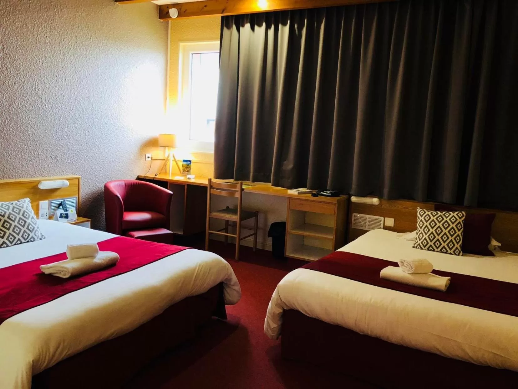 Bed in Logis Hôtel Atrium Epinal Golbey