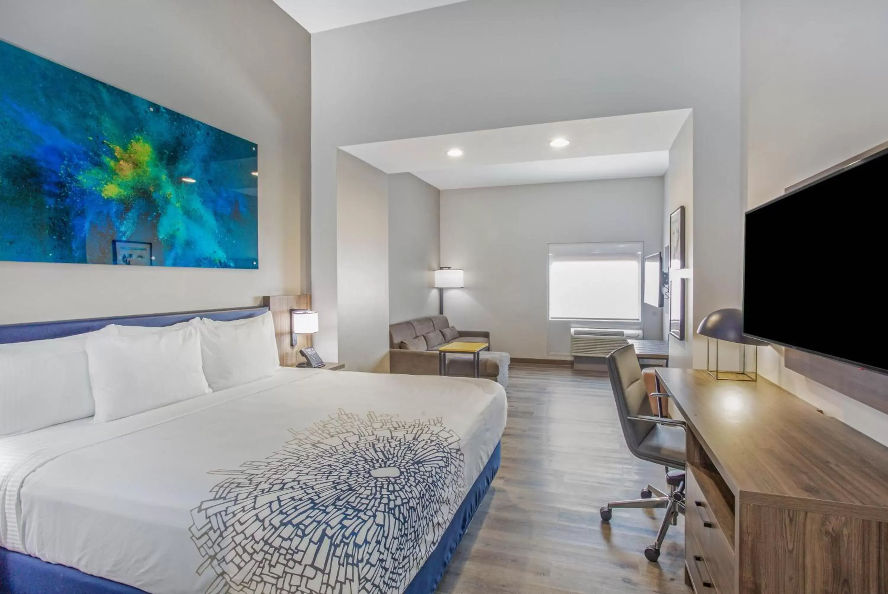 Photo of the whole room, TV/Entertainment Center in La Quinta Inn & Suites by Wyndham Miramar Beach-Destin
