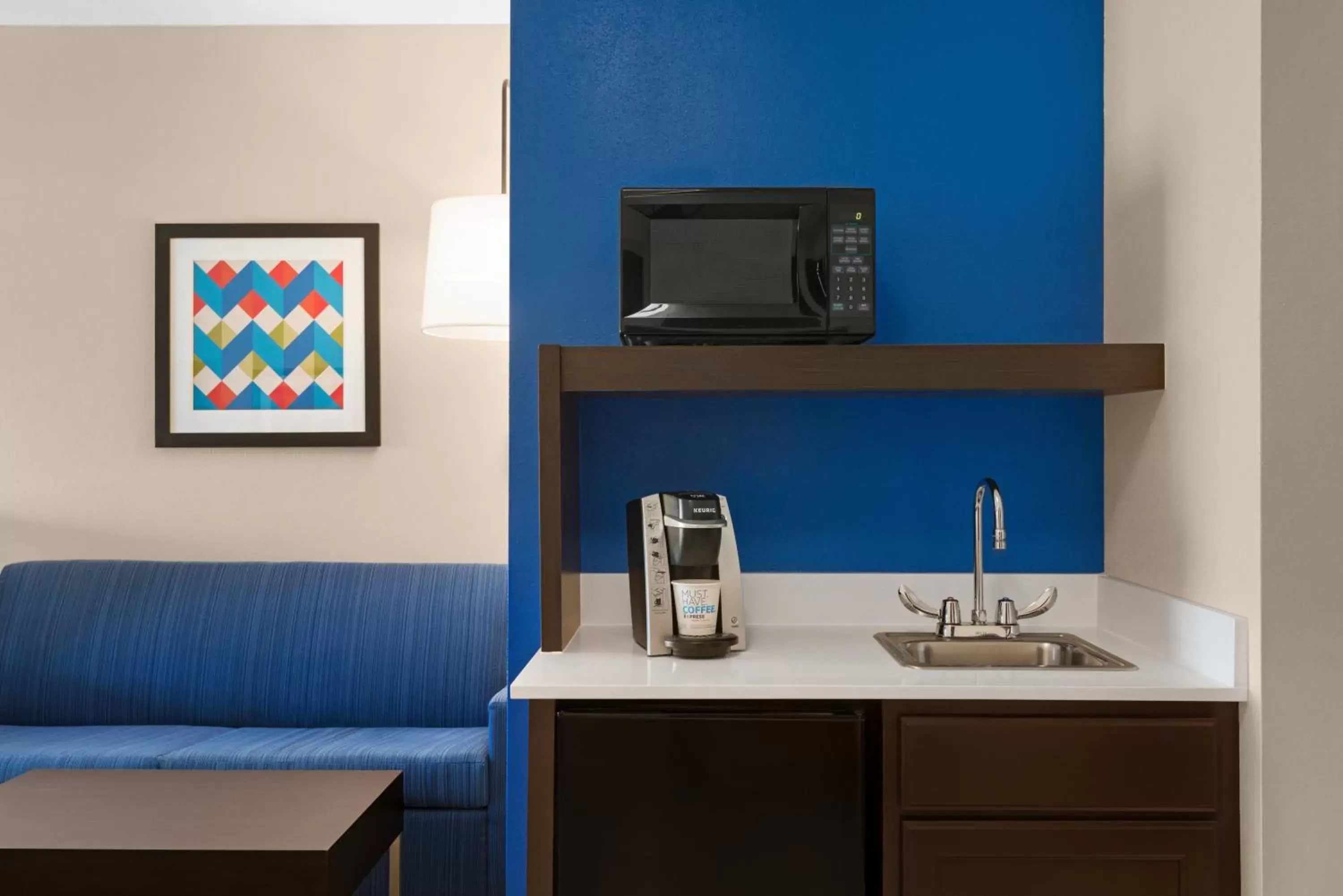 Photo of the whole room, Kitchen/Kitchenette in Holiday Inn Express Hotel & Suites McAlester, an IHG Hotel