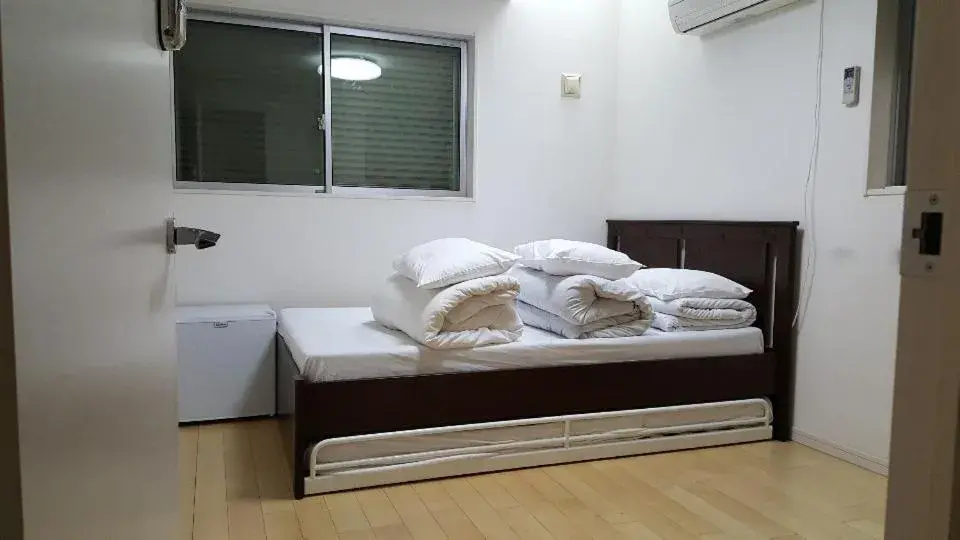 Bed in Sophiearth Apartment