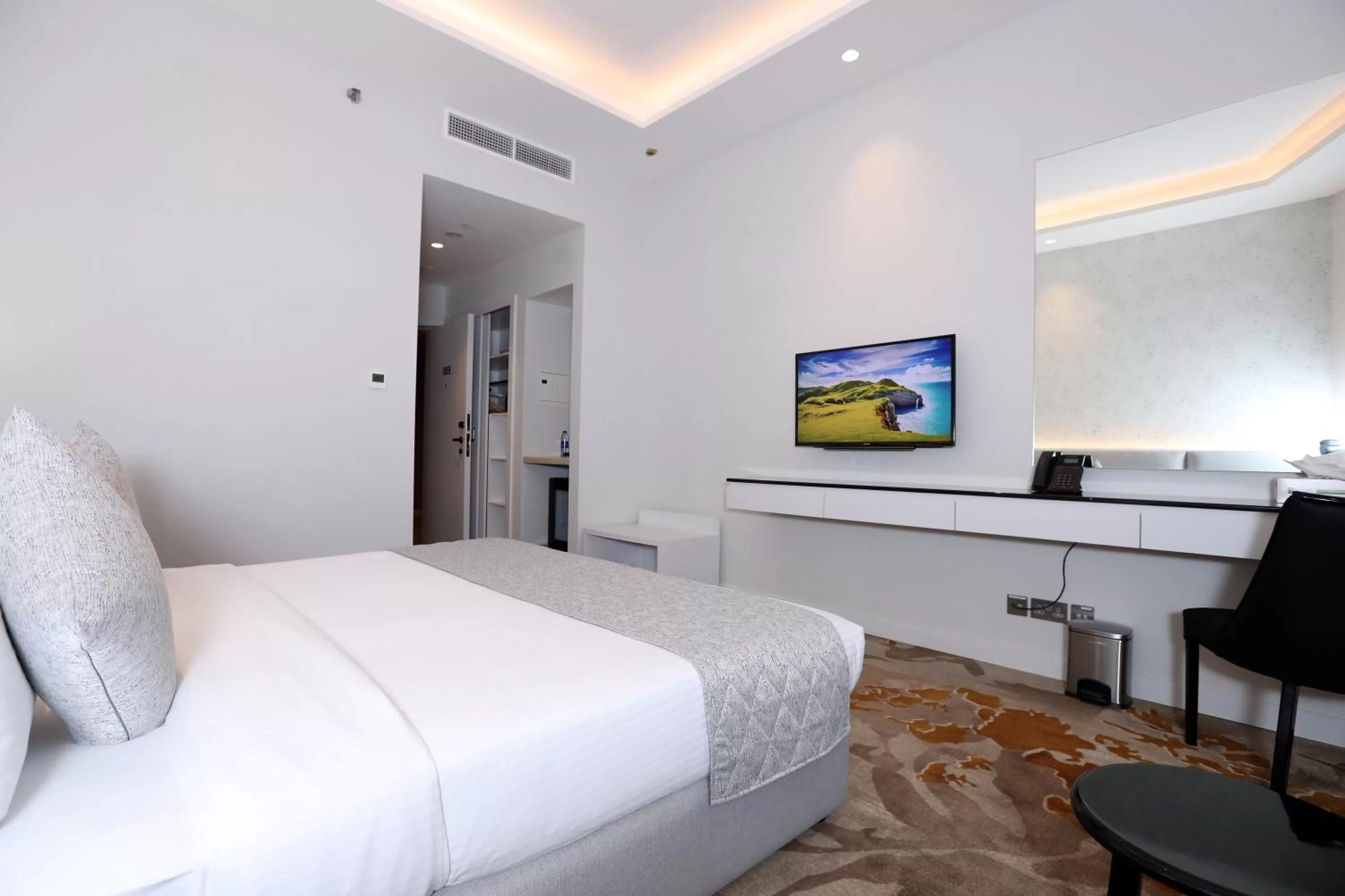Bed in eStay Hotel