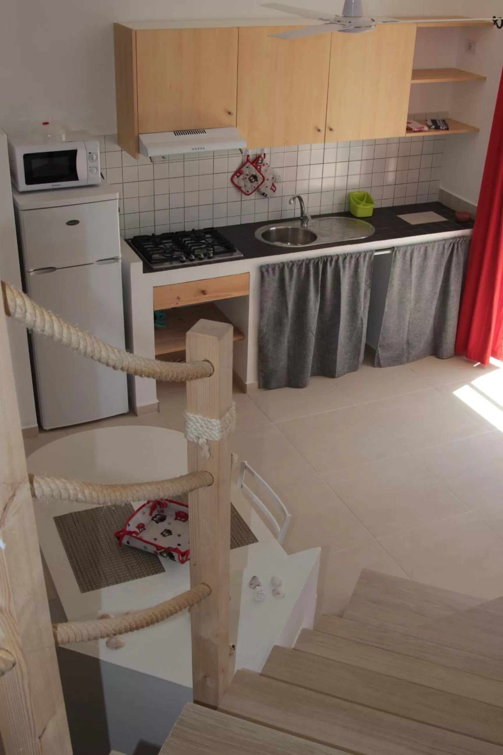 Kitchen or kitchenette in Cala da Lua apartments