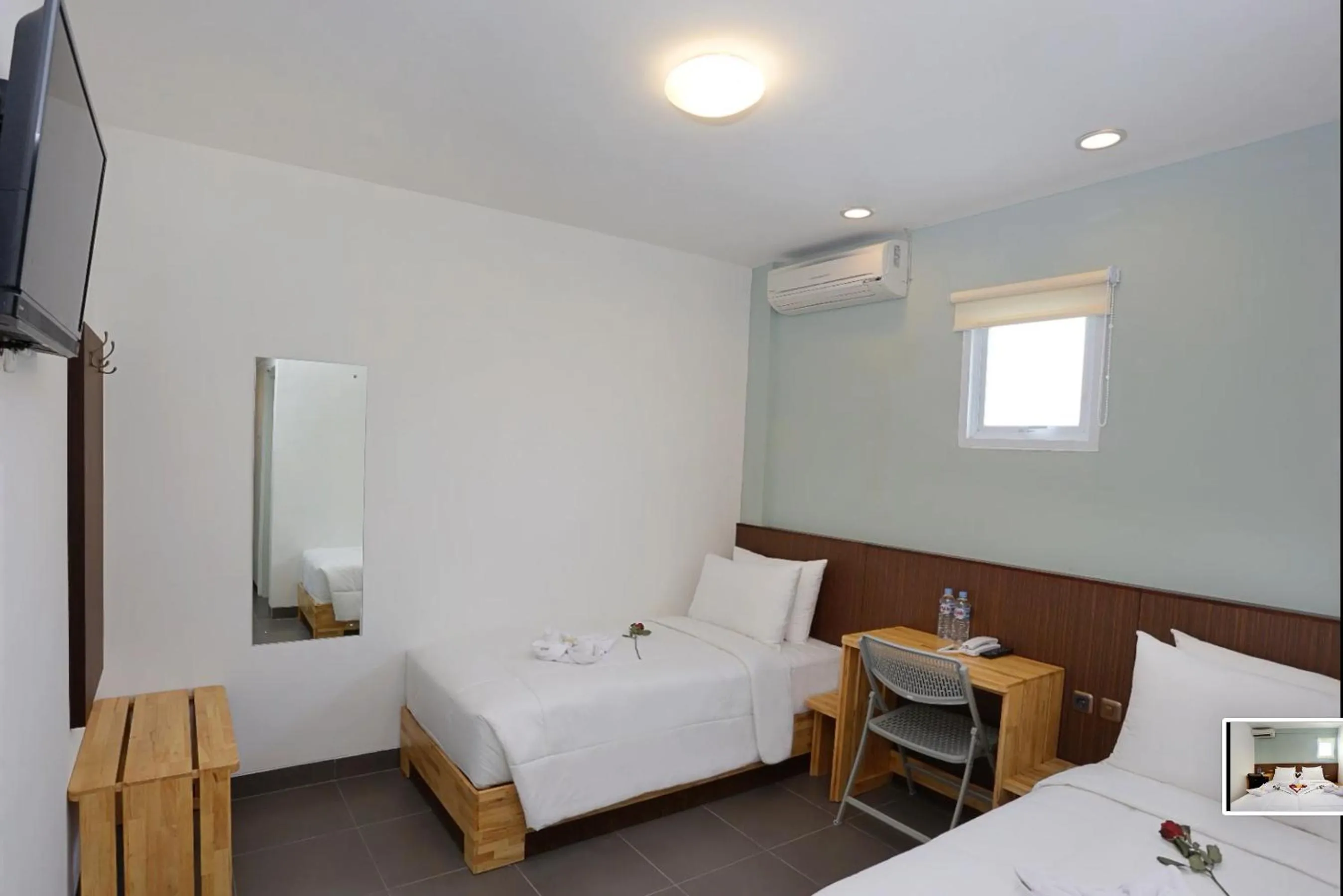 Bed in Duo Legian Hotel