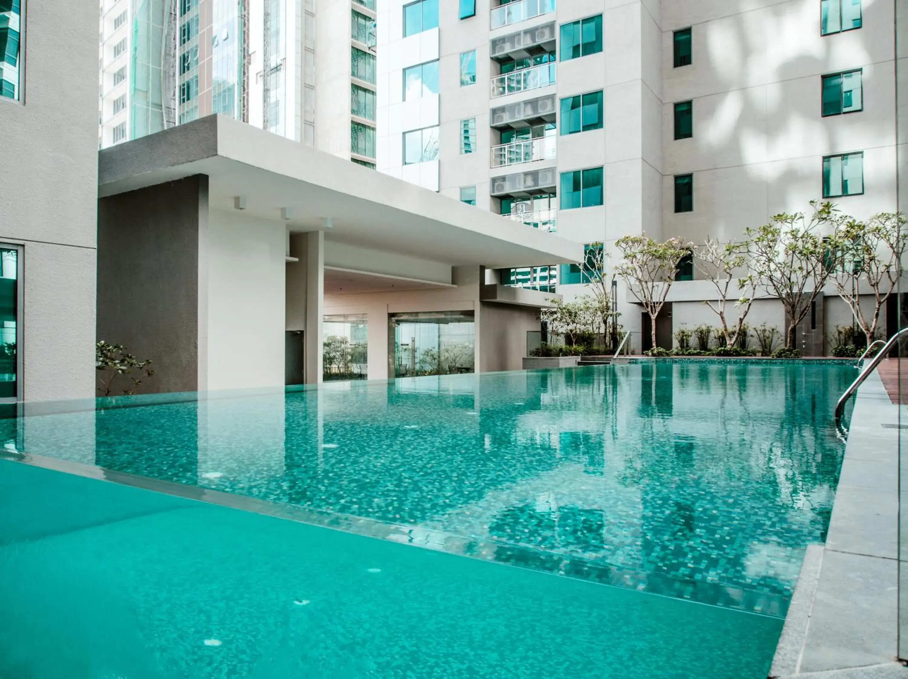 Swimming Pool in Summer Suites Residences by Subhome
