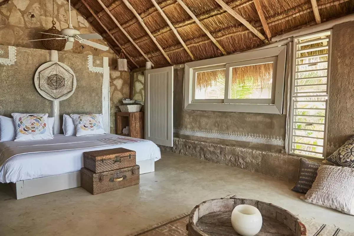Photo of the whole room, Bed in Nomade Tulum