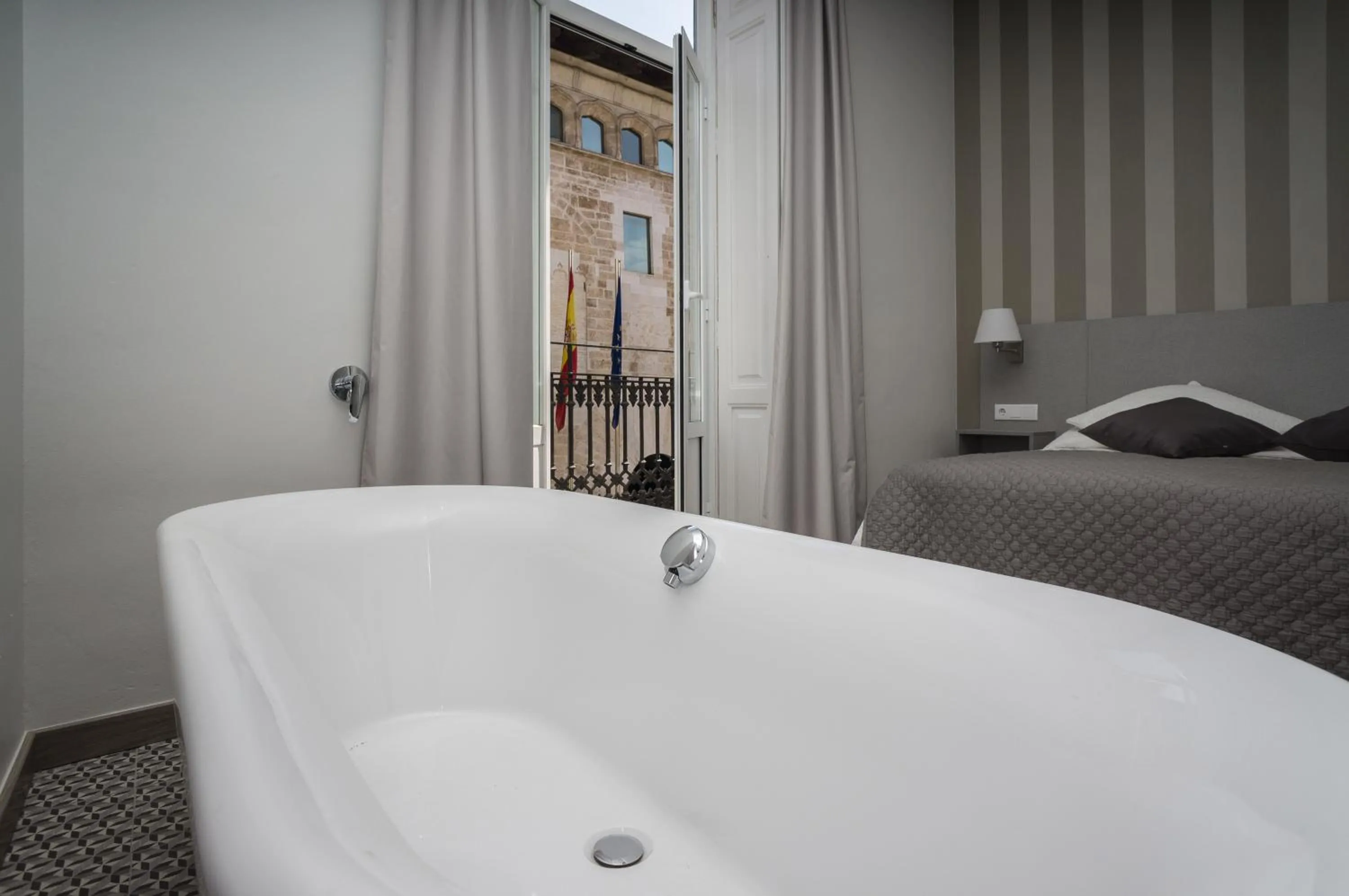 Bed in Hotel San Lorenzo Boutique Plaza