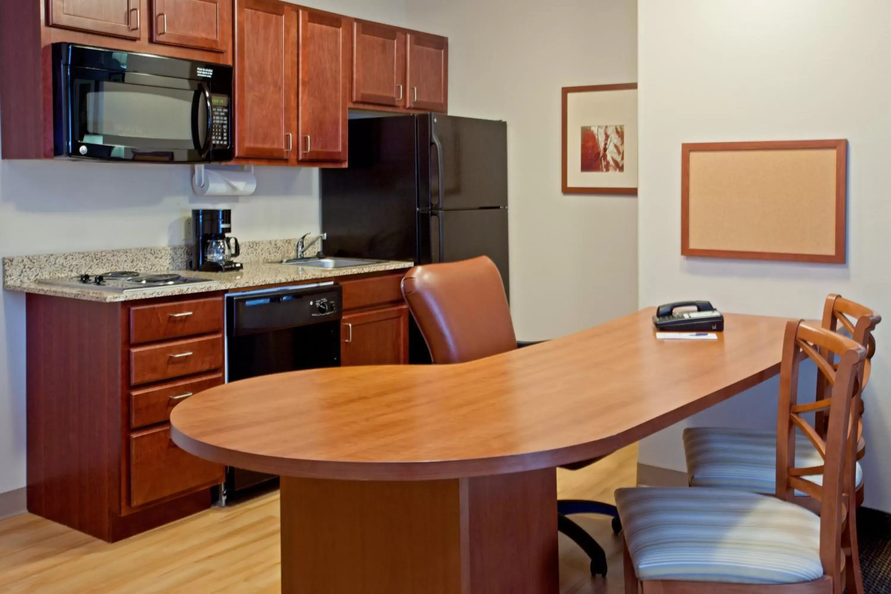 Photo of the whole room, Kitchen/Kitchenette in Candlewood Suites Houston Westchase - Westheimer, an IHG Hotel
